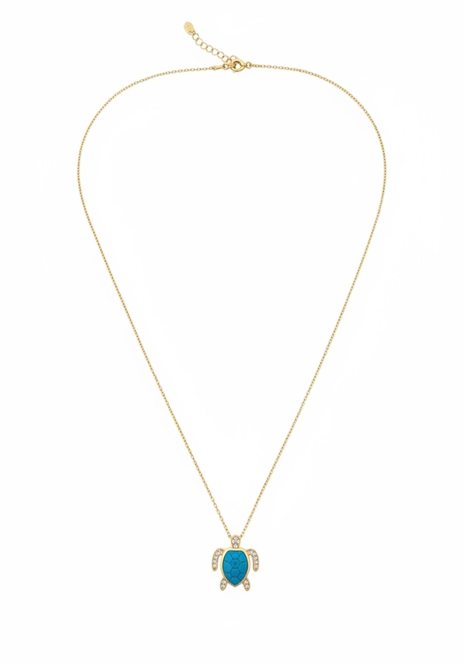 Gold necklace with a turquoise turtle pendant on a white background