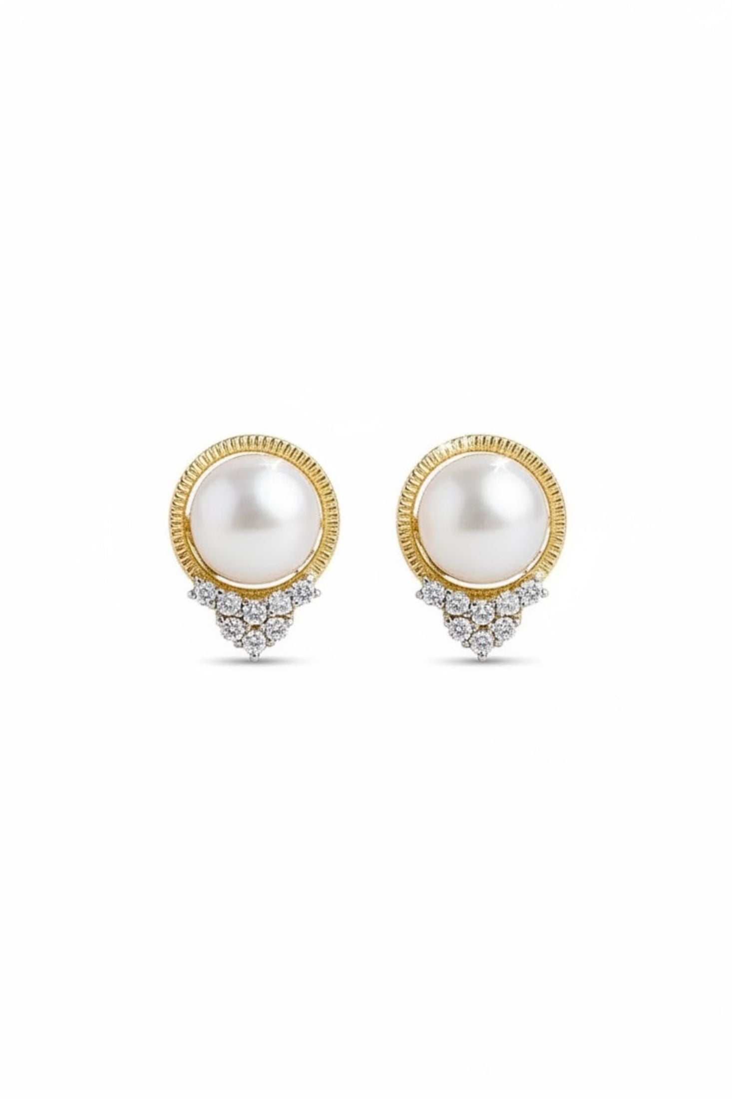 Pair of pearl earrings with gold and diamond accents on a white background
