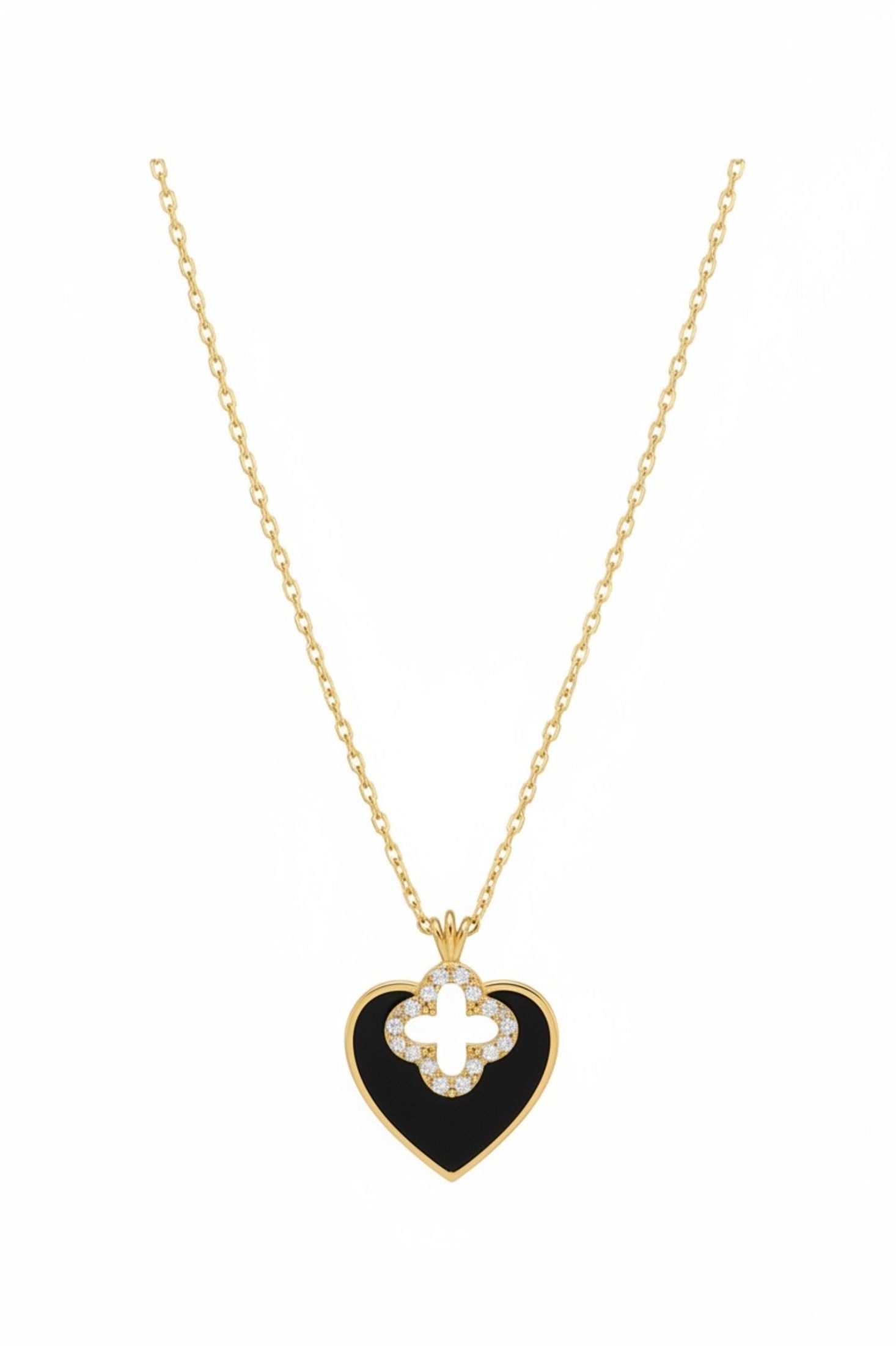 Necklace with a heart-shaped pendant featuring a clover design on a white background