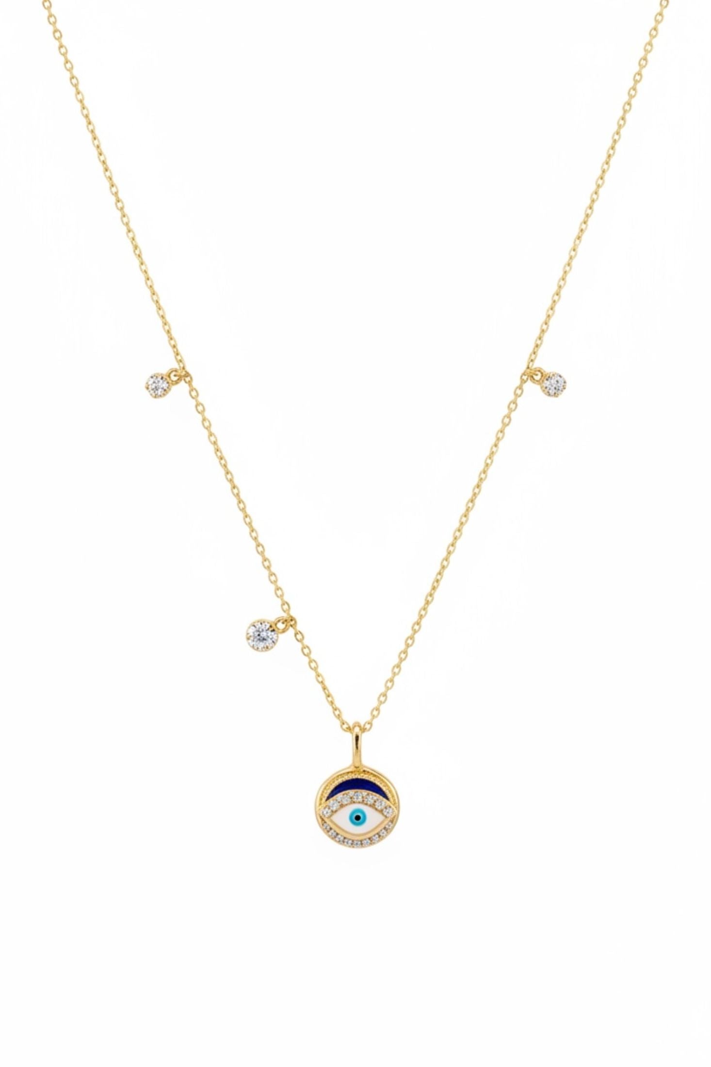 Gold necklace with an eye-shaped pendant on a white background