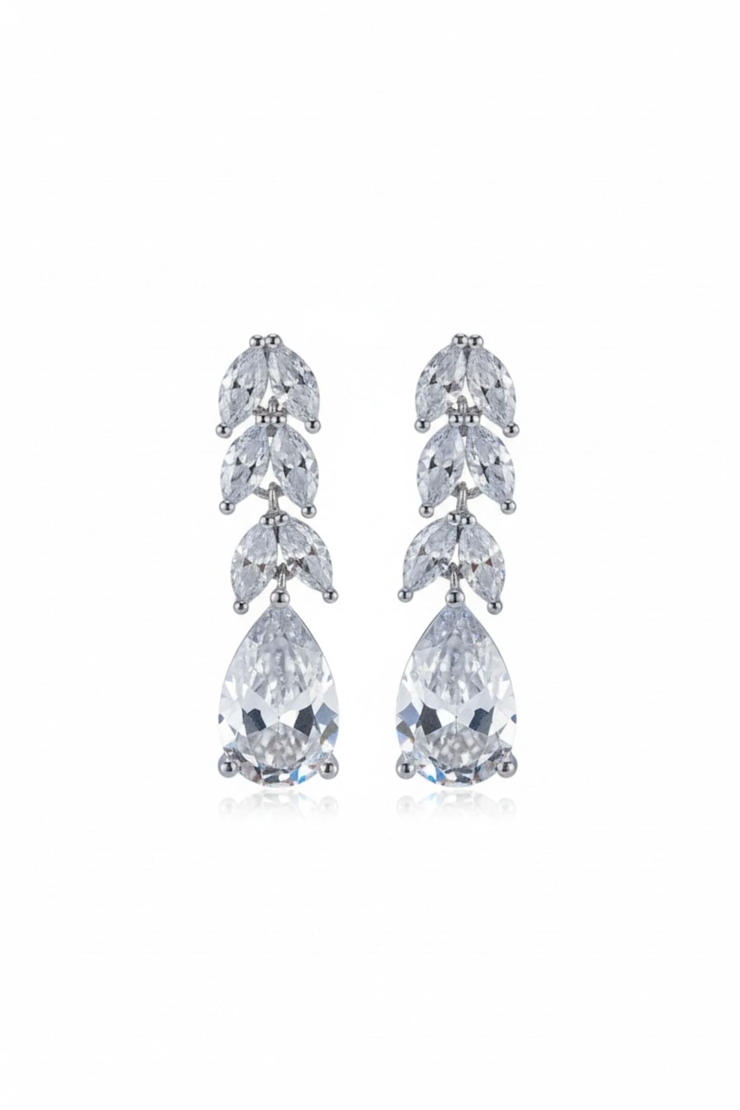 Pair of teardrop-shaped earrings on a white background