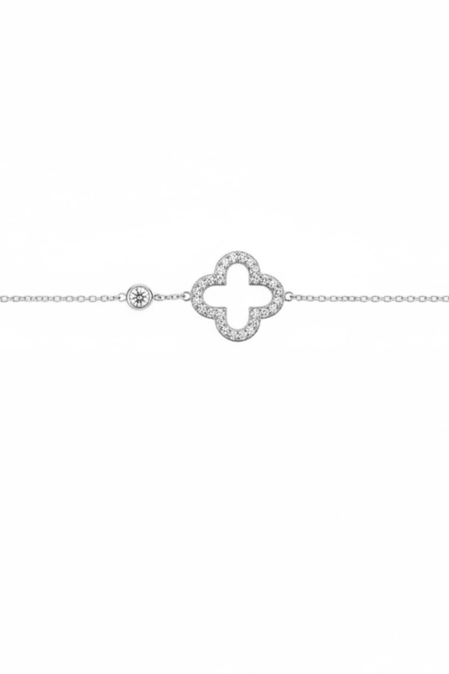 Silver clover bracelet on a white background