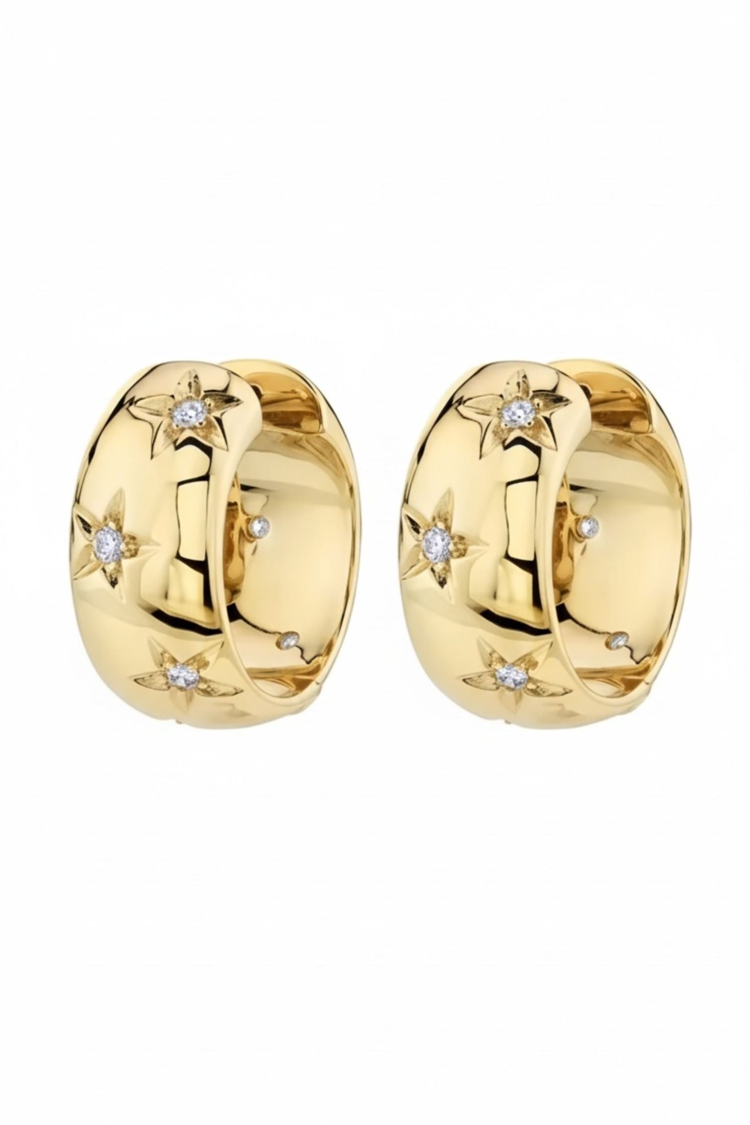 Gold hoop earrings with embedded diamonds on a white background