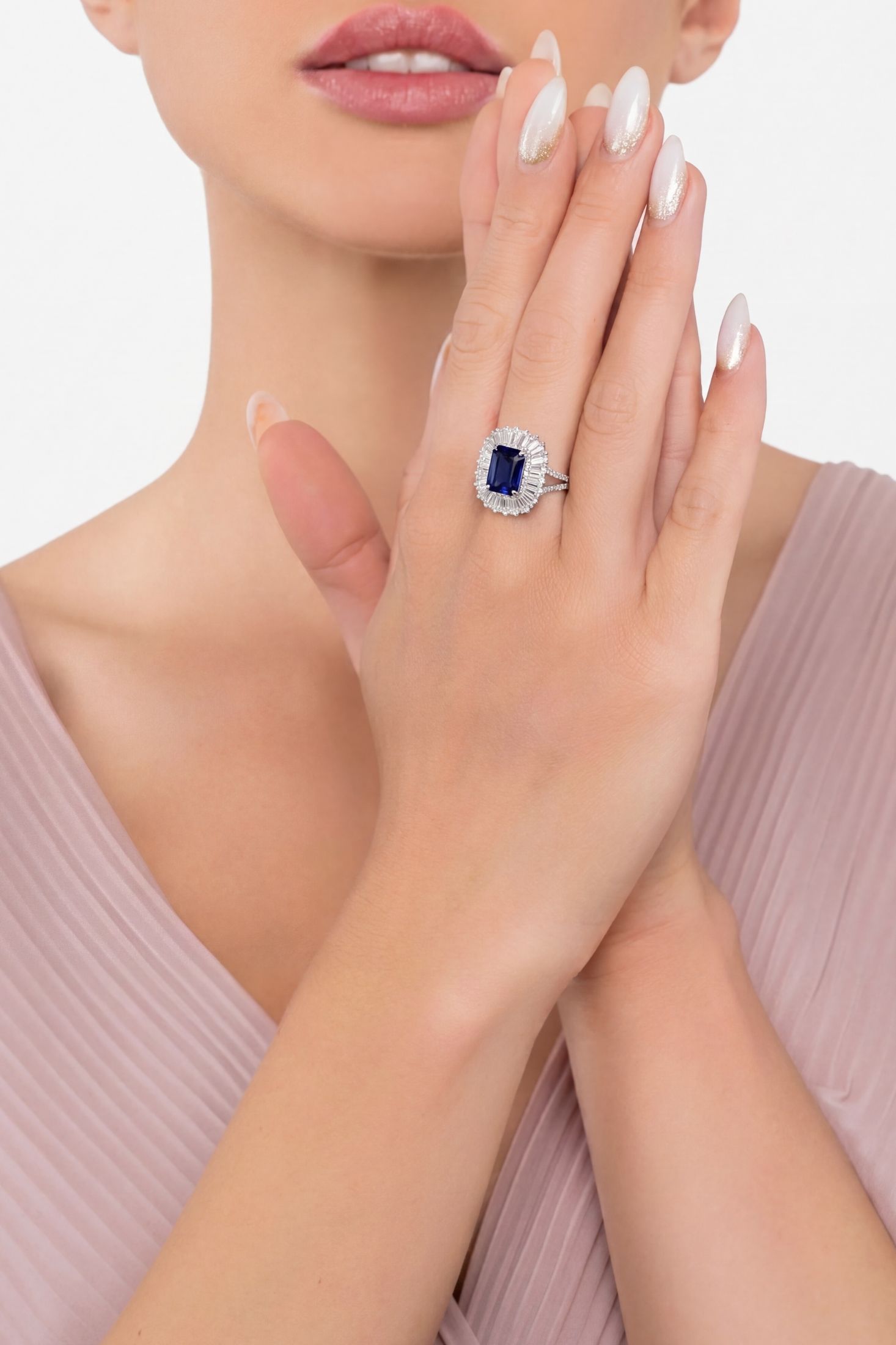 Angled view of Countess Cocktail Ring Sapphire Silver, showing sapphire detailing, silver finish and the jewellery profile.