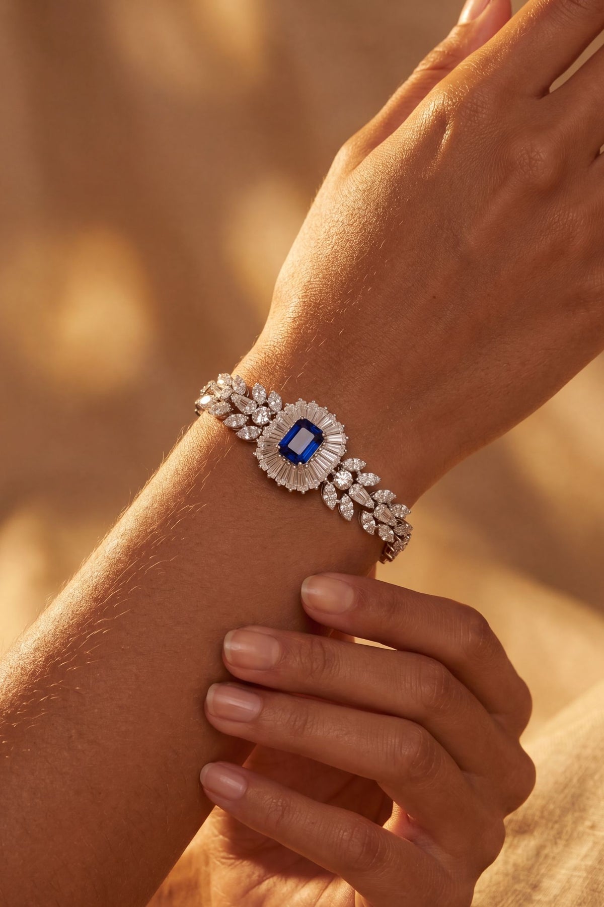 Angled view of Countess Gemstone Bracelet Sapphire Silver, showing sapphire detailing, silver finish and the jewellery profile.