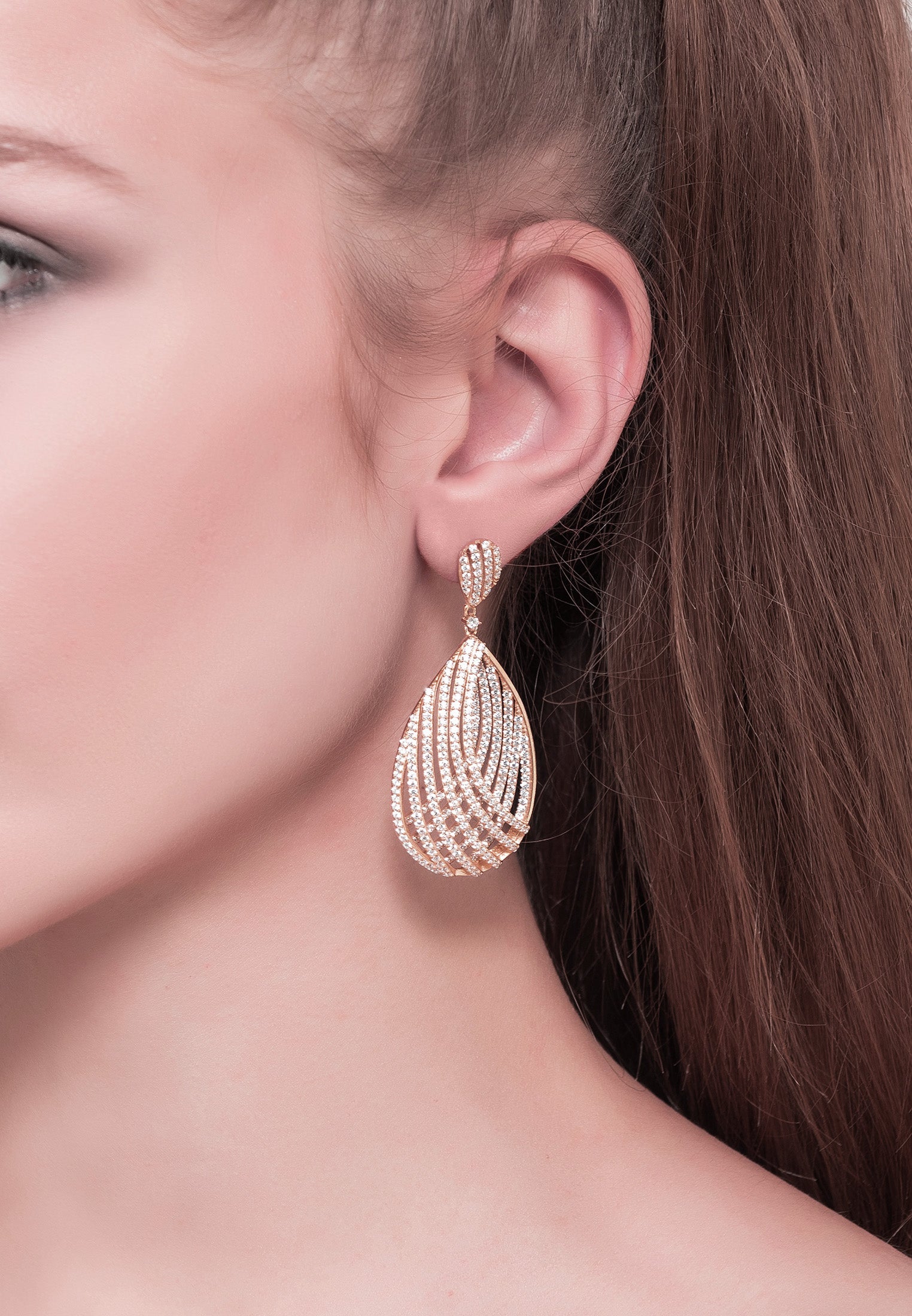 The earring worn by a model.