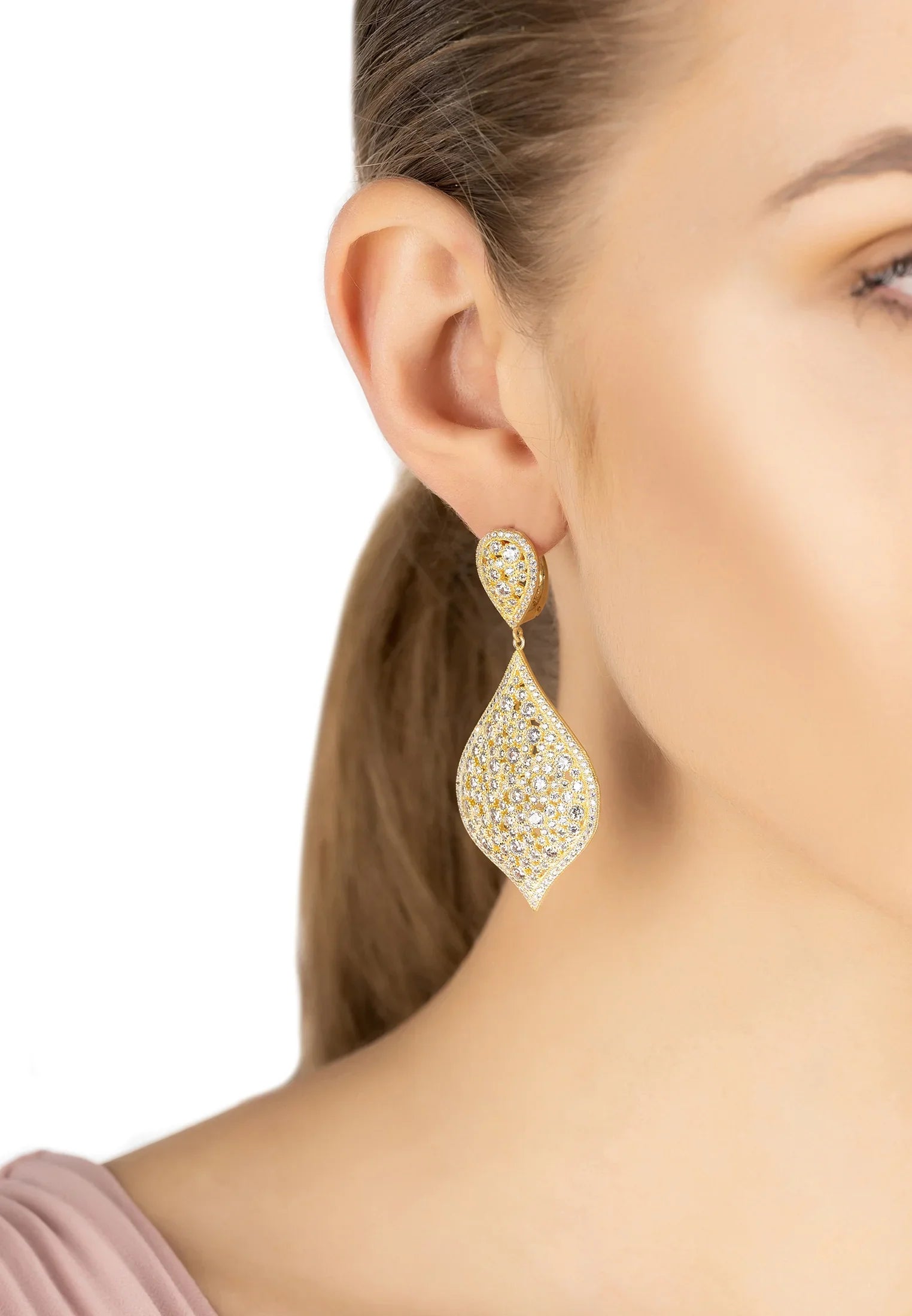 The earring worn by a model.