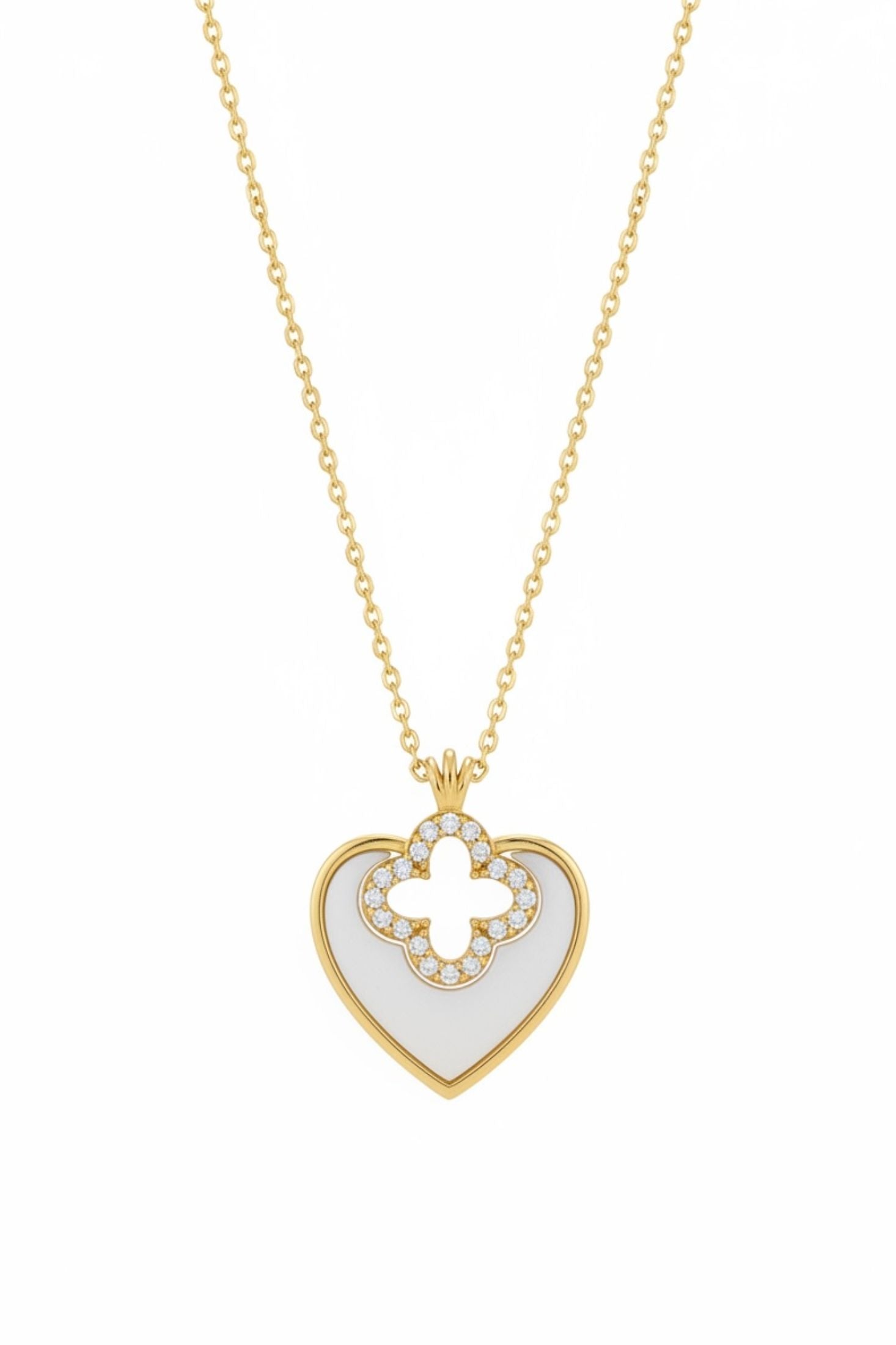 Gold necklace with a heart-shaped pendant on a white background