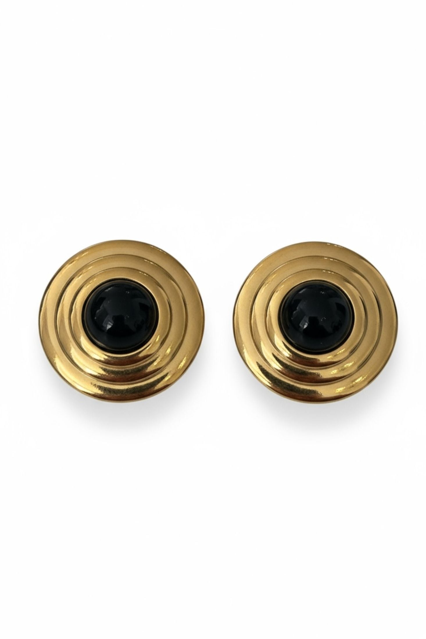 Gold and onyx stud earrings.