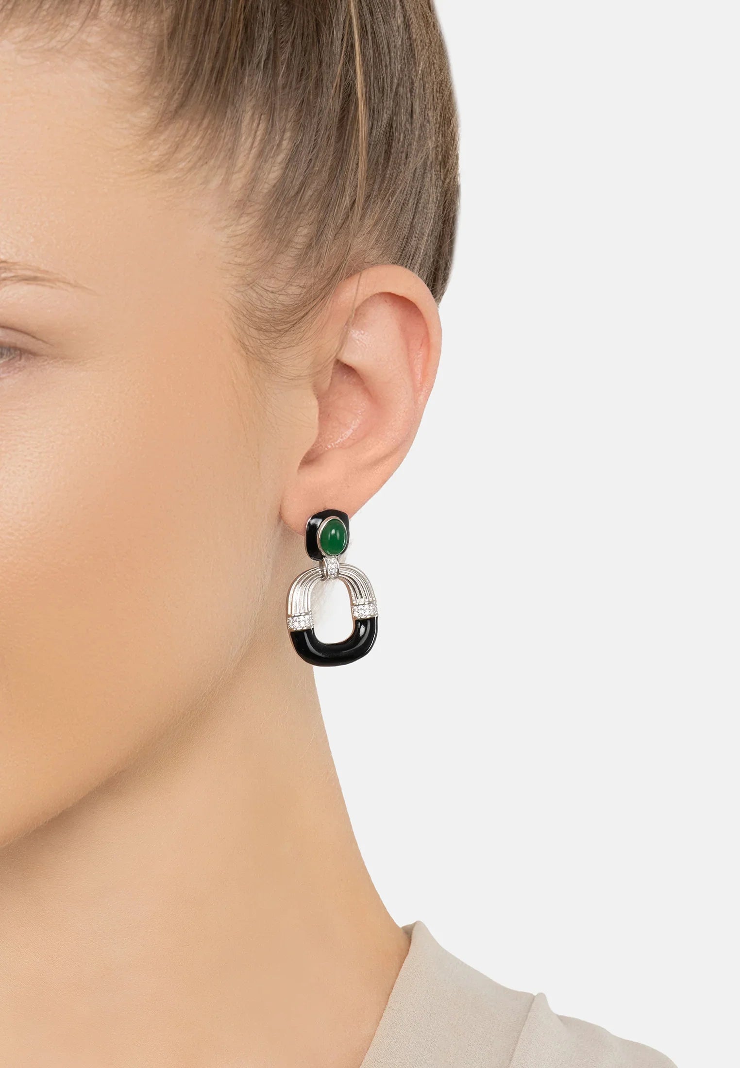 The earring worn by a model.