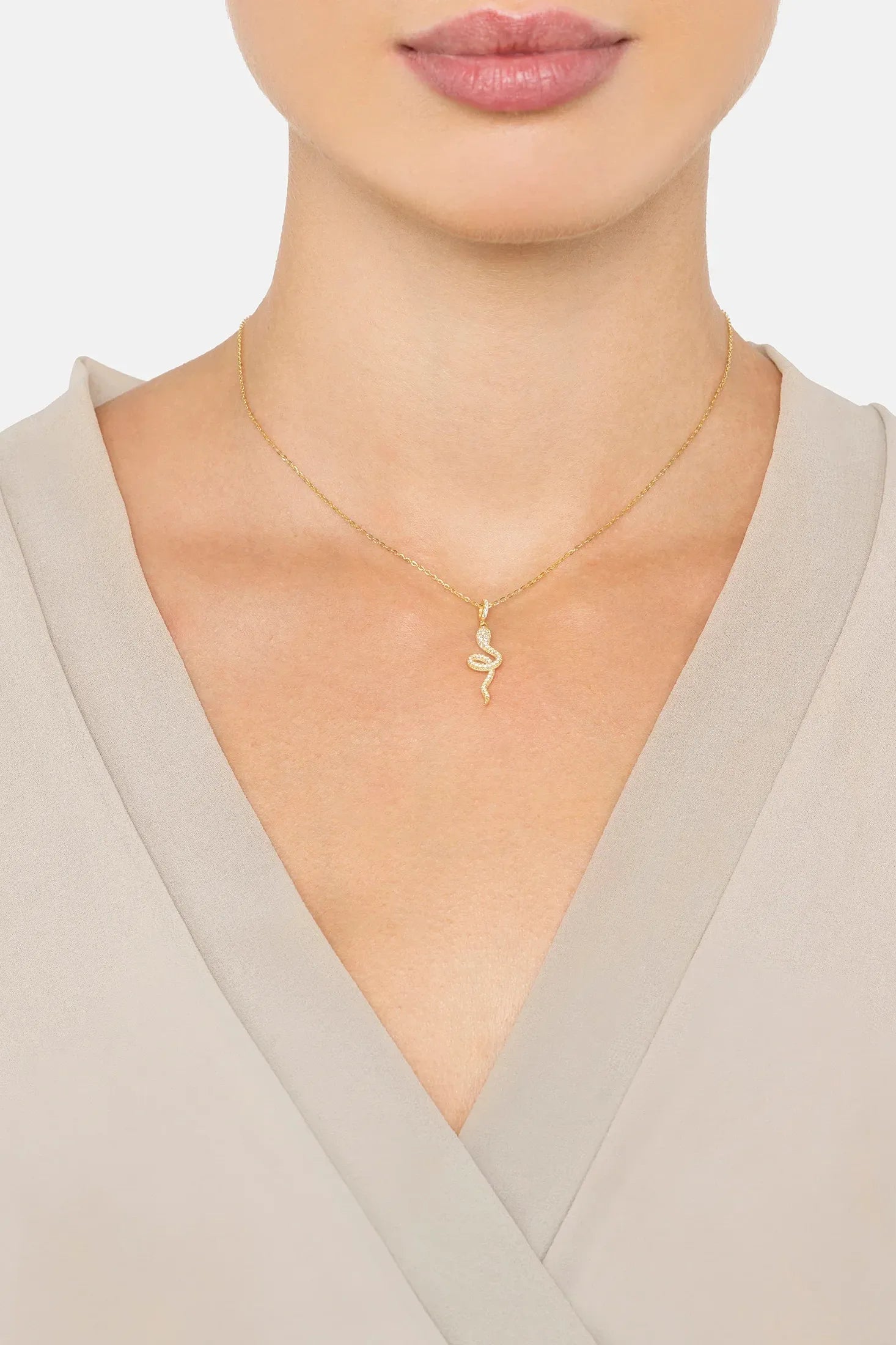 The necklace worn by a model.