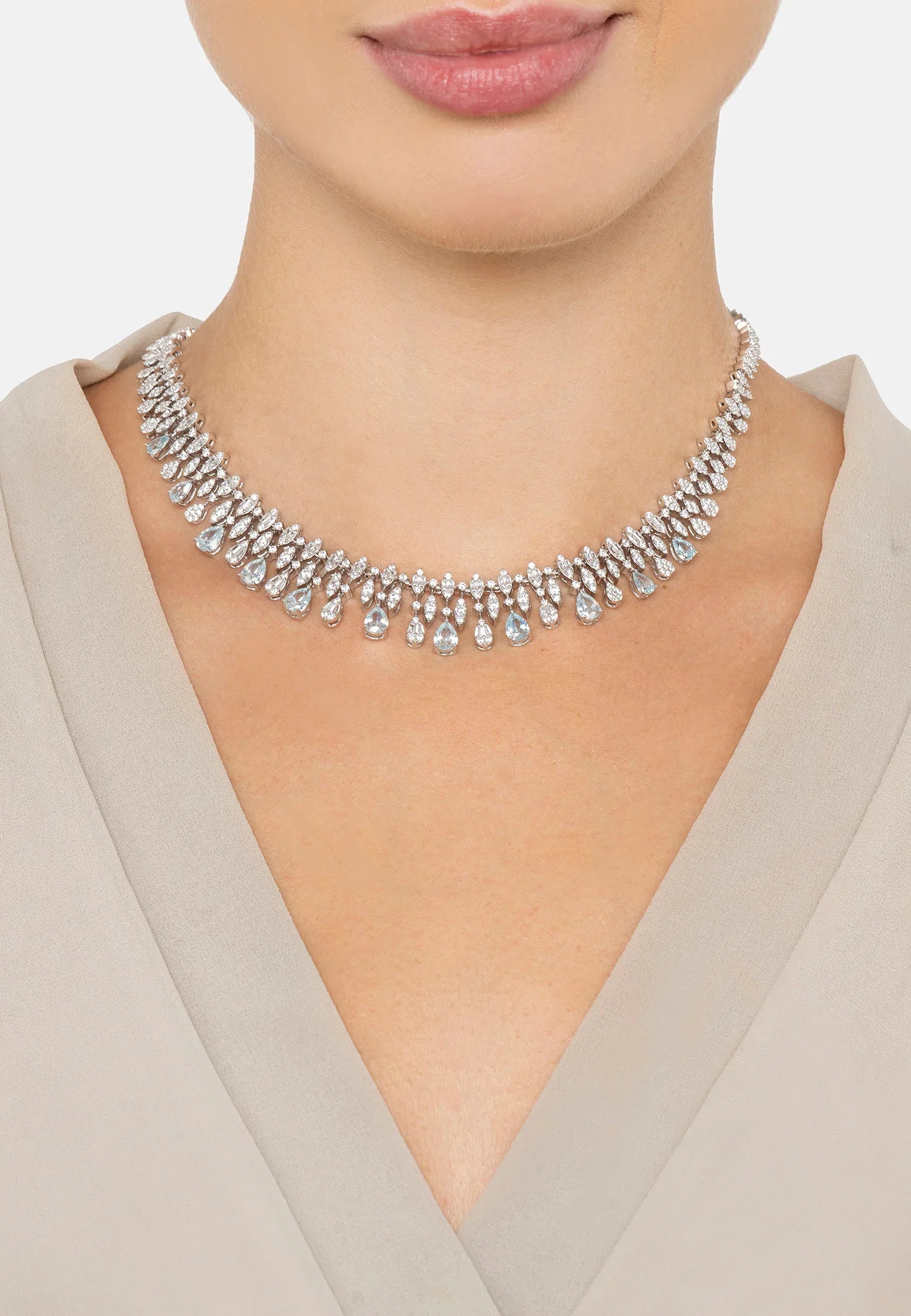 The necklace worn by a model.