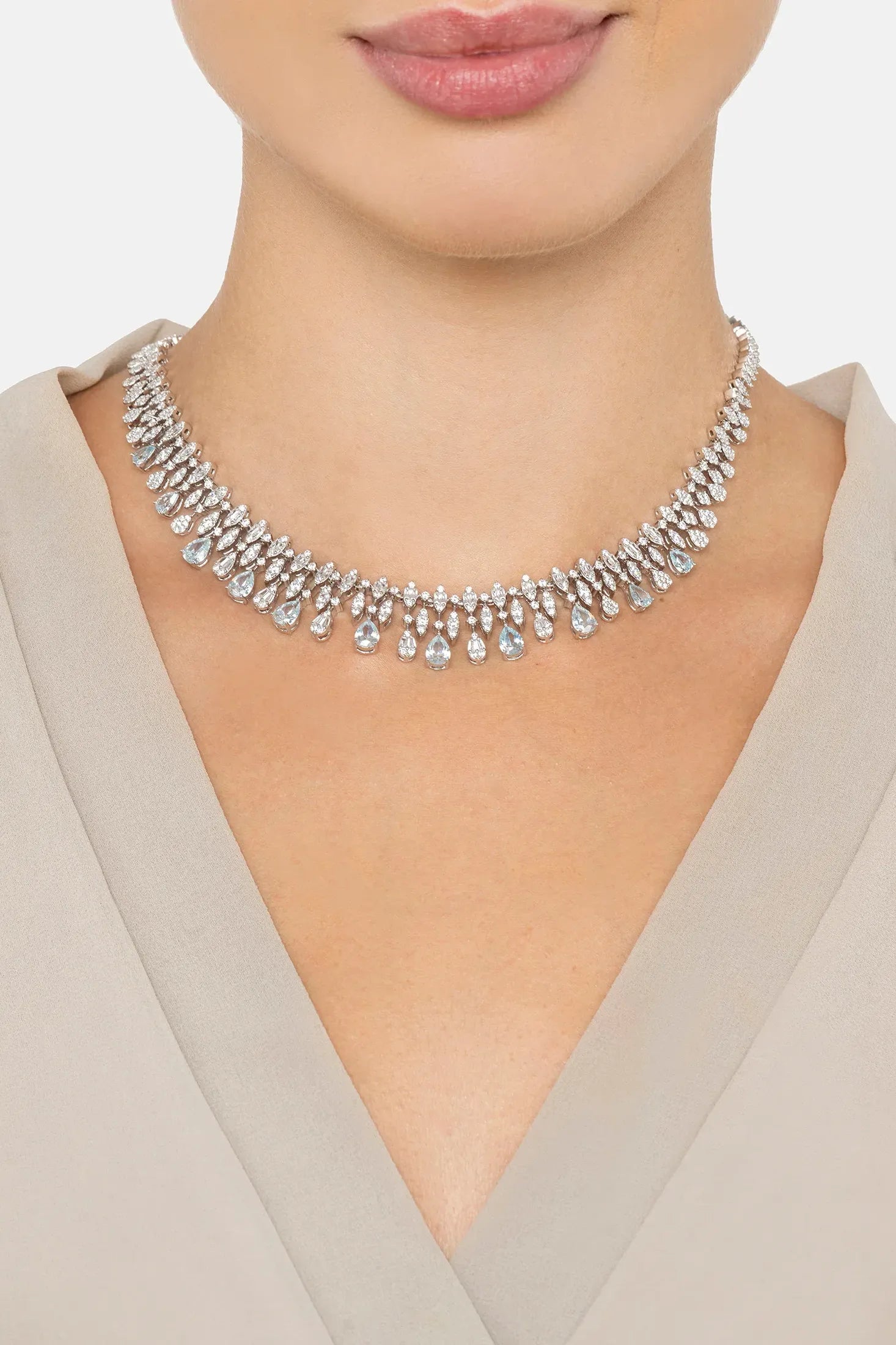 The necklace worn by a model.