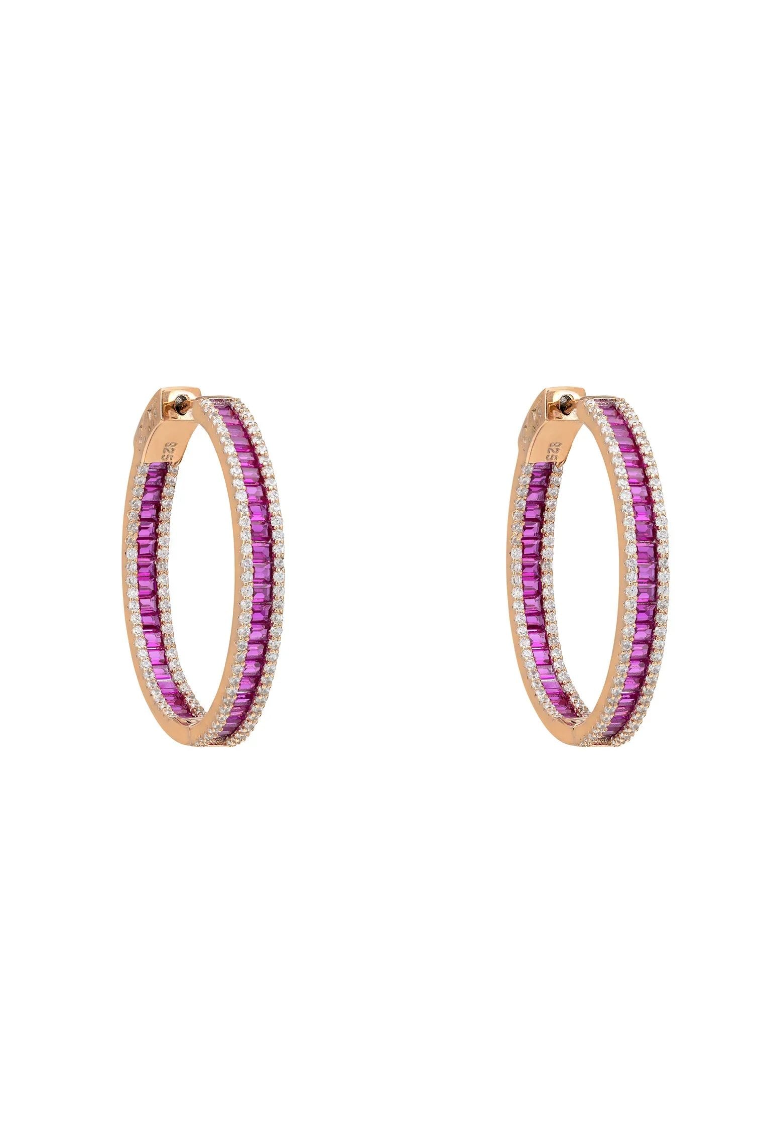 Rose gold ruby hoop earrings.