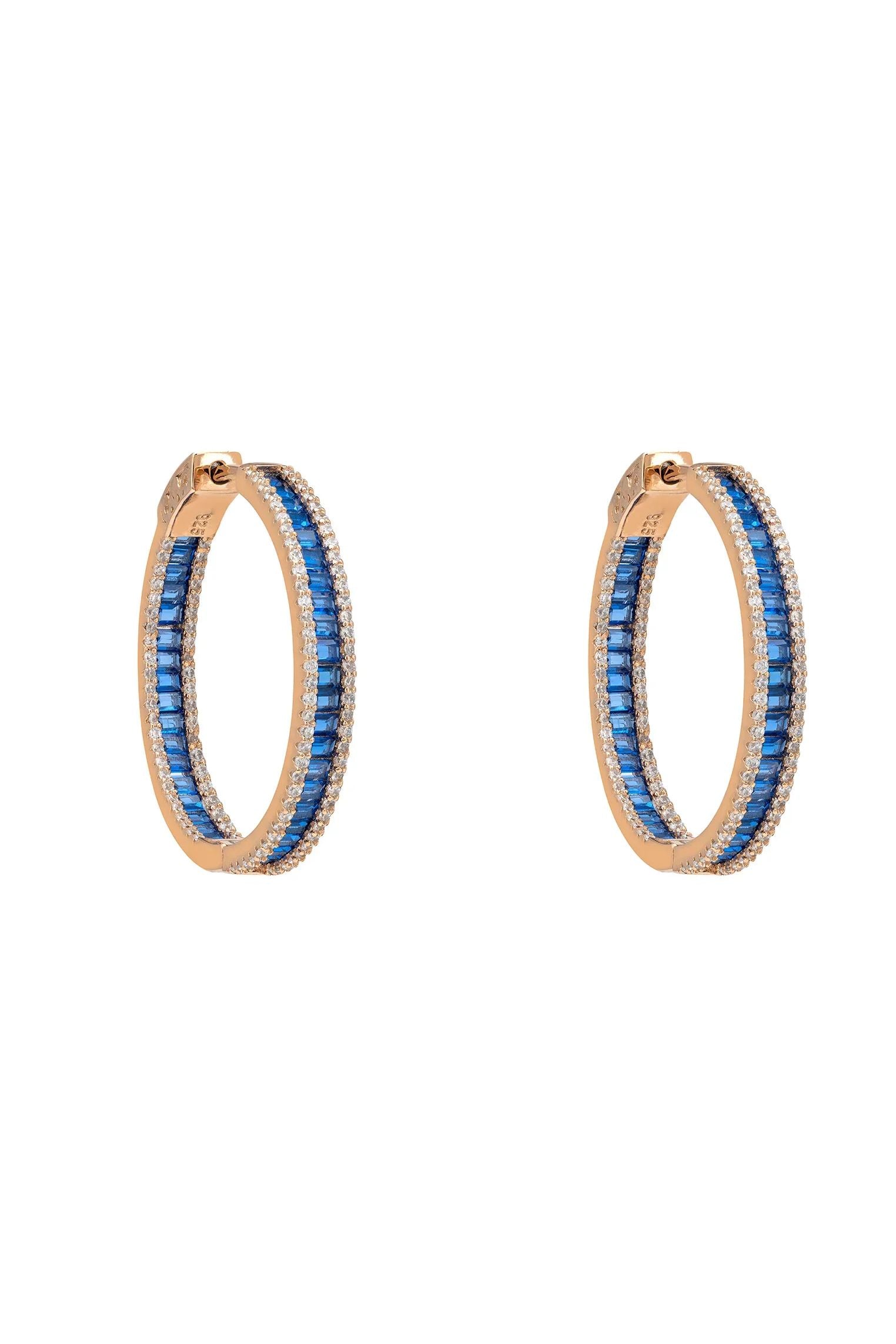 Rose gold sapphire hoop earrings.