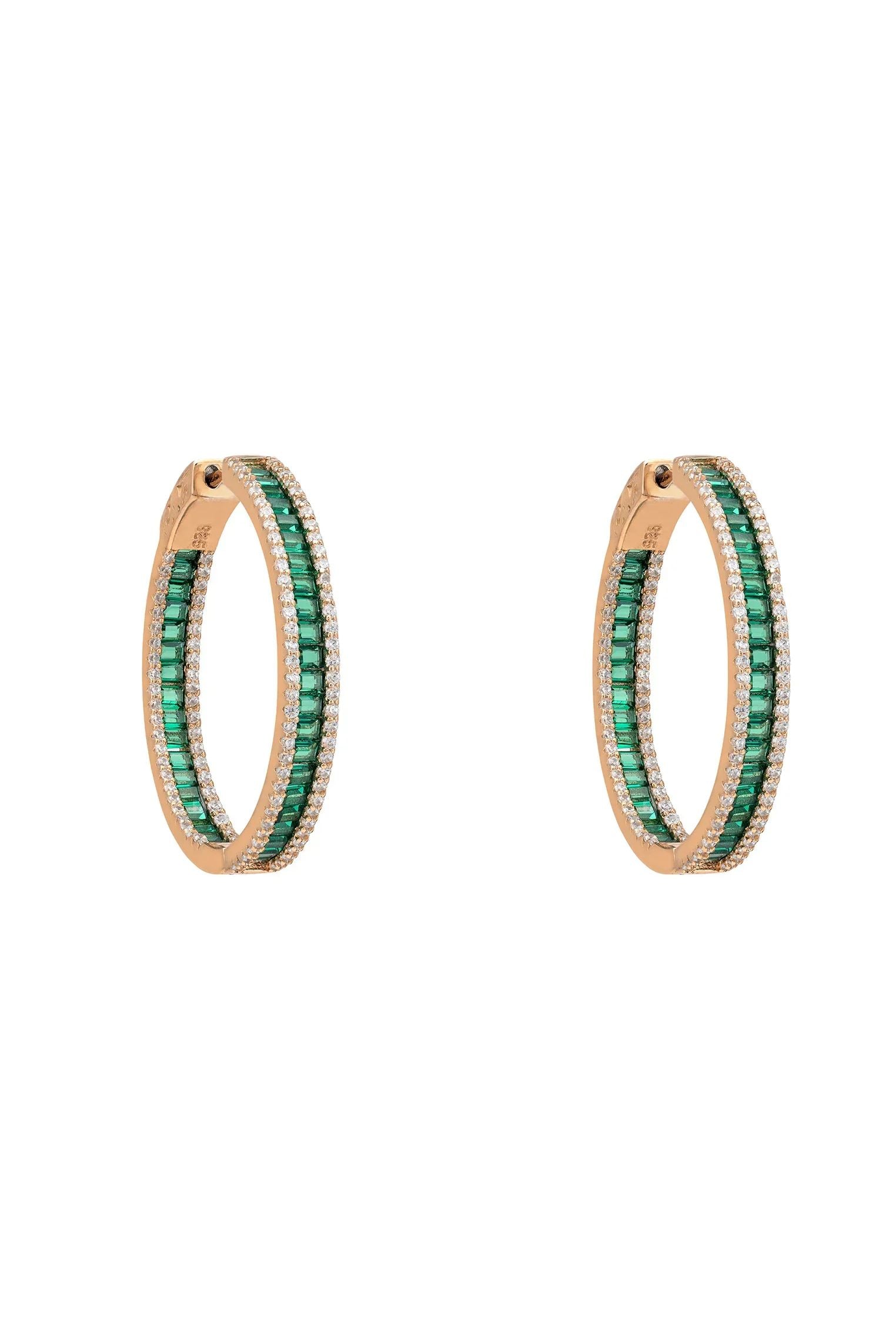 Rose gold emerald hoop earrings.
