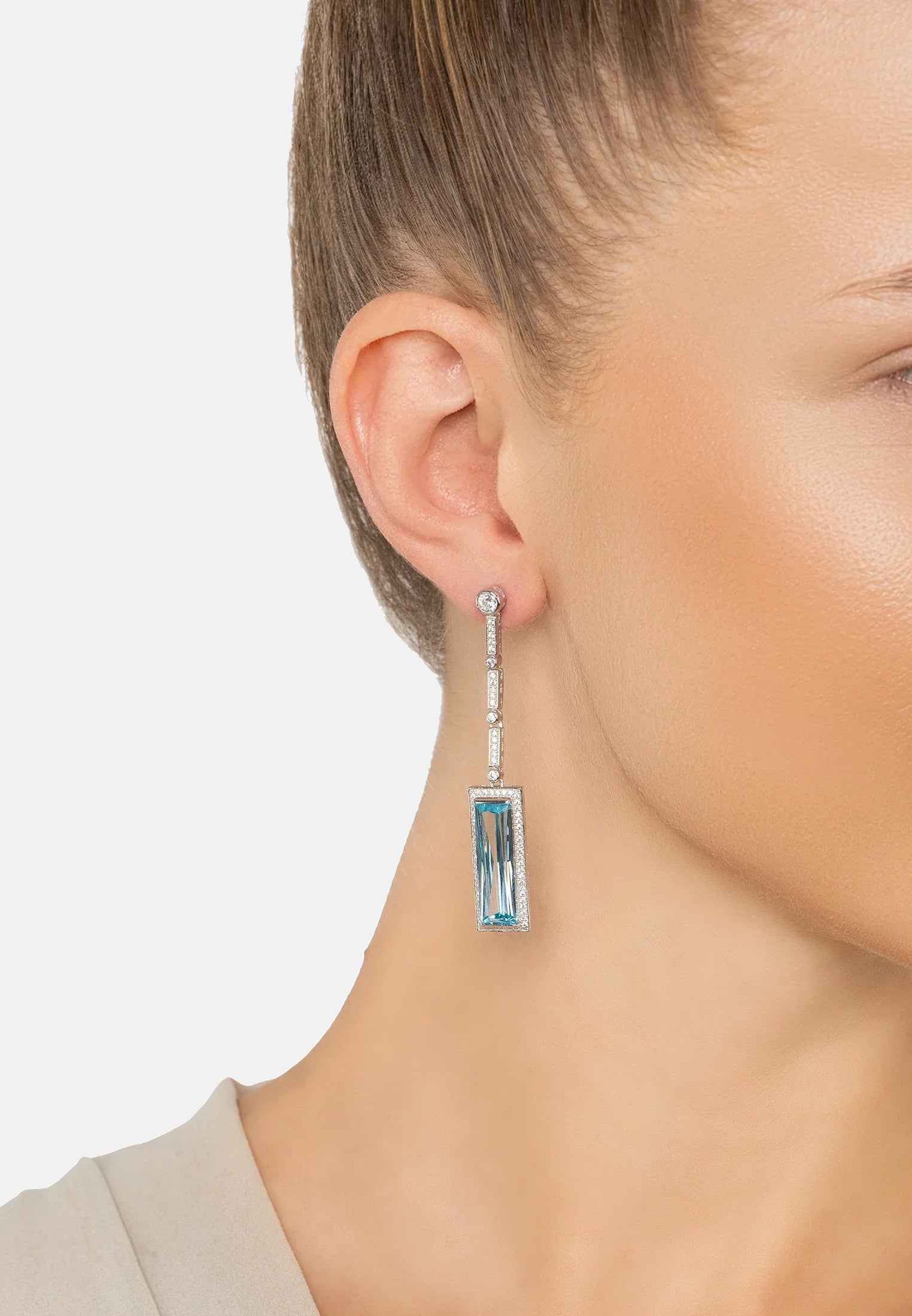 The earring worn by a model.