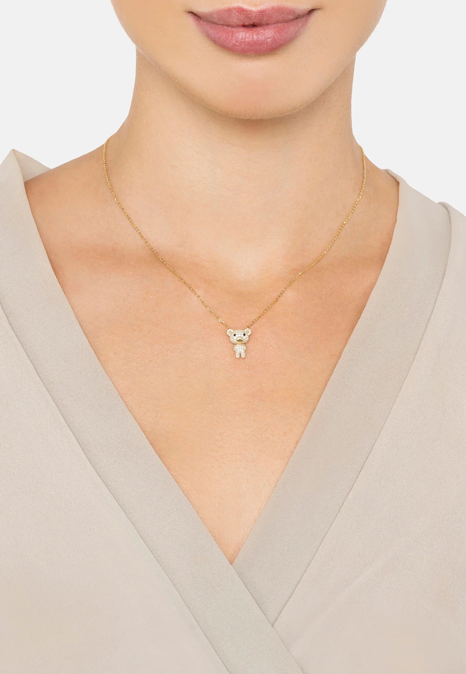 The necklace worn by a model.