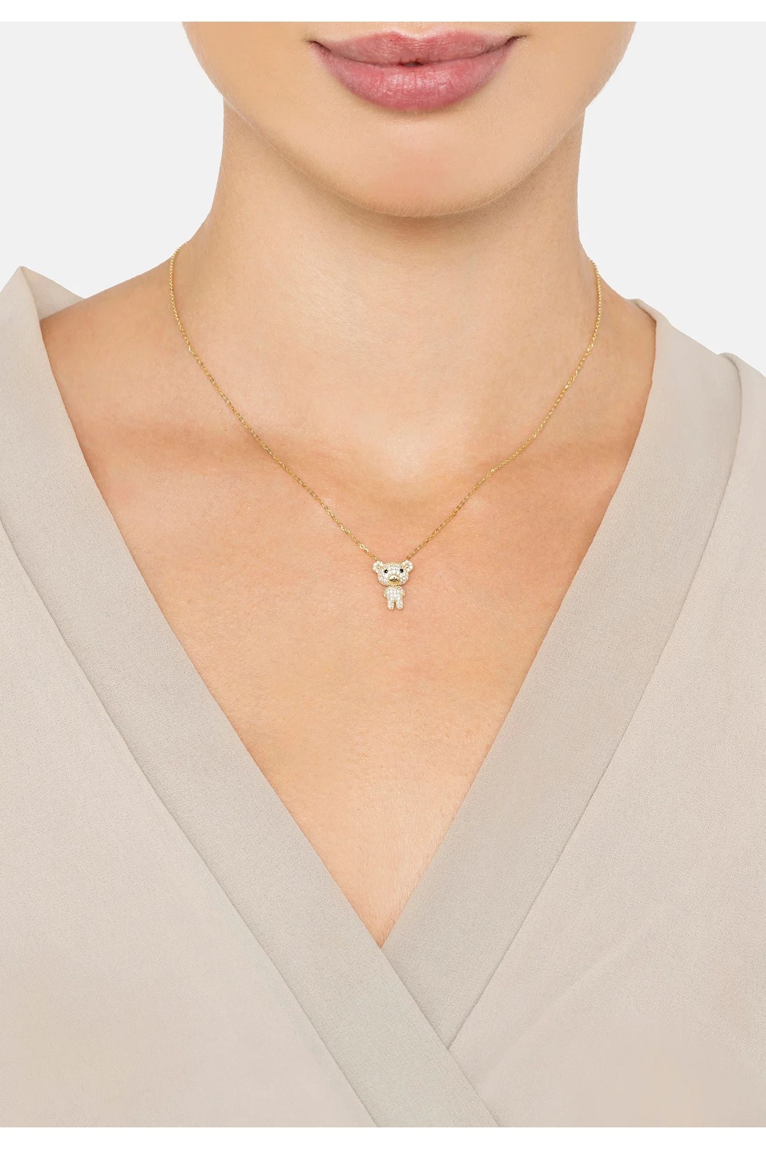 The necklace worn by a model.