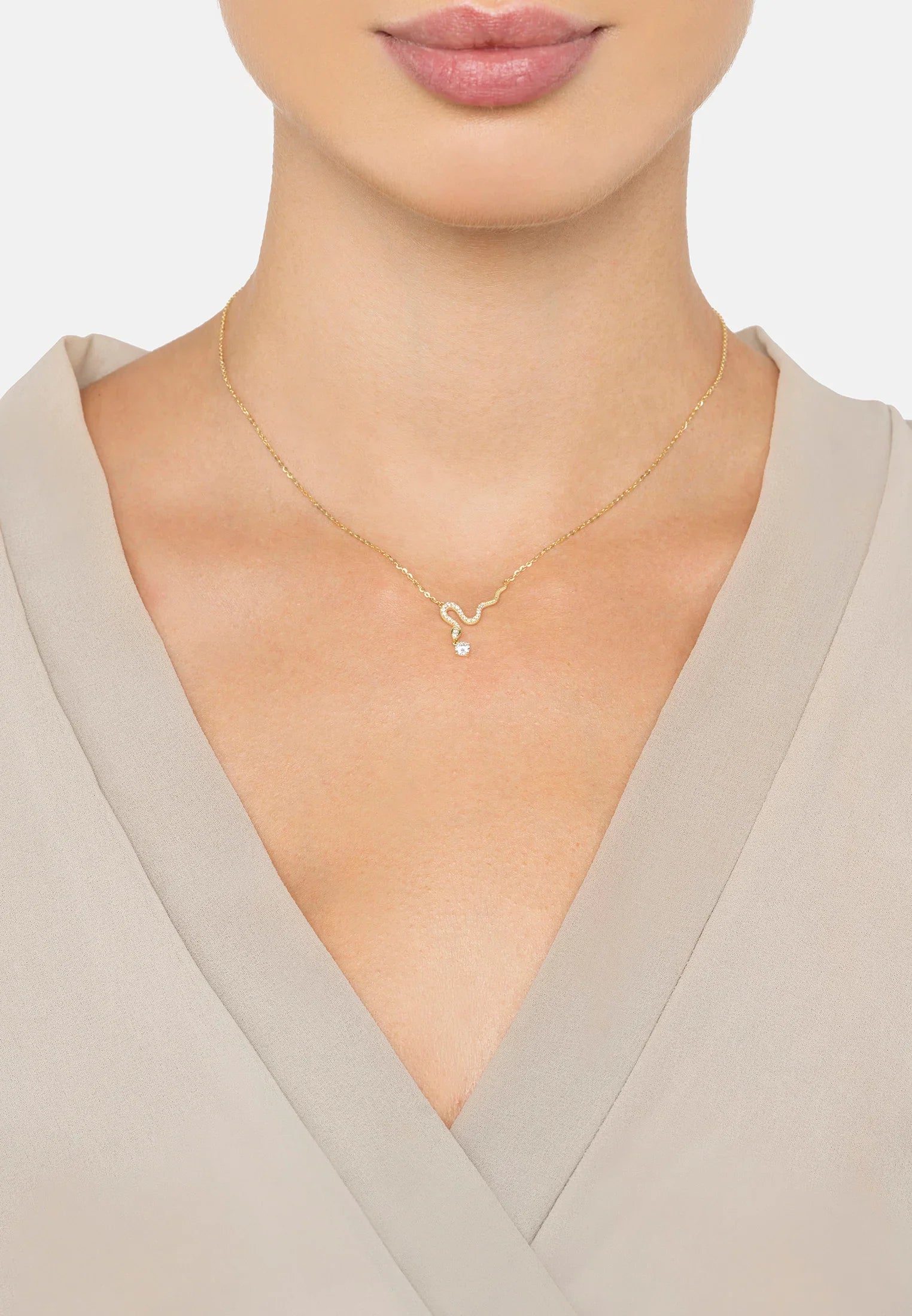 The necklace worn by a model.