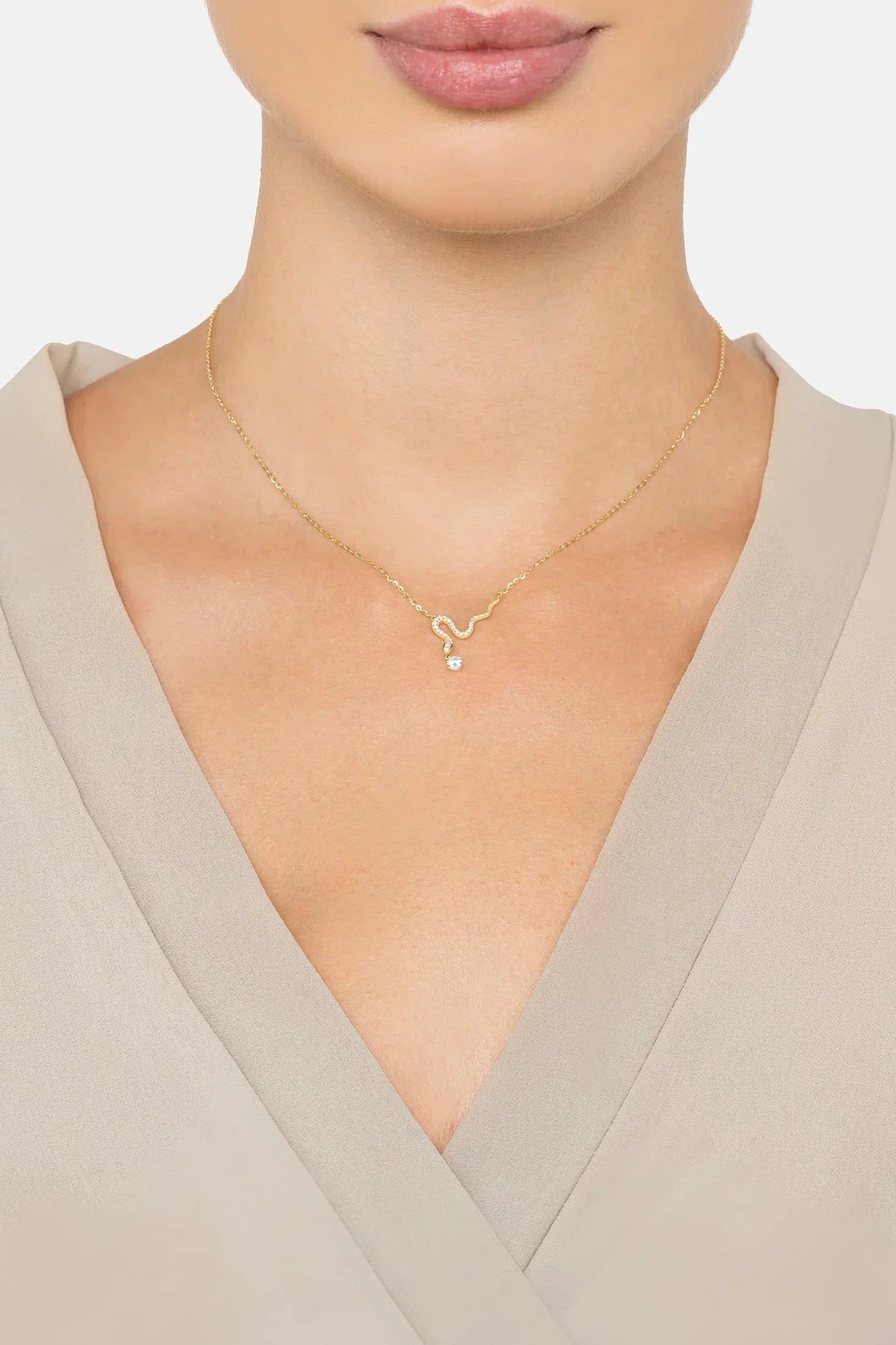The necklace worn by a model.