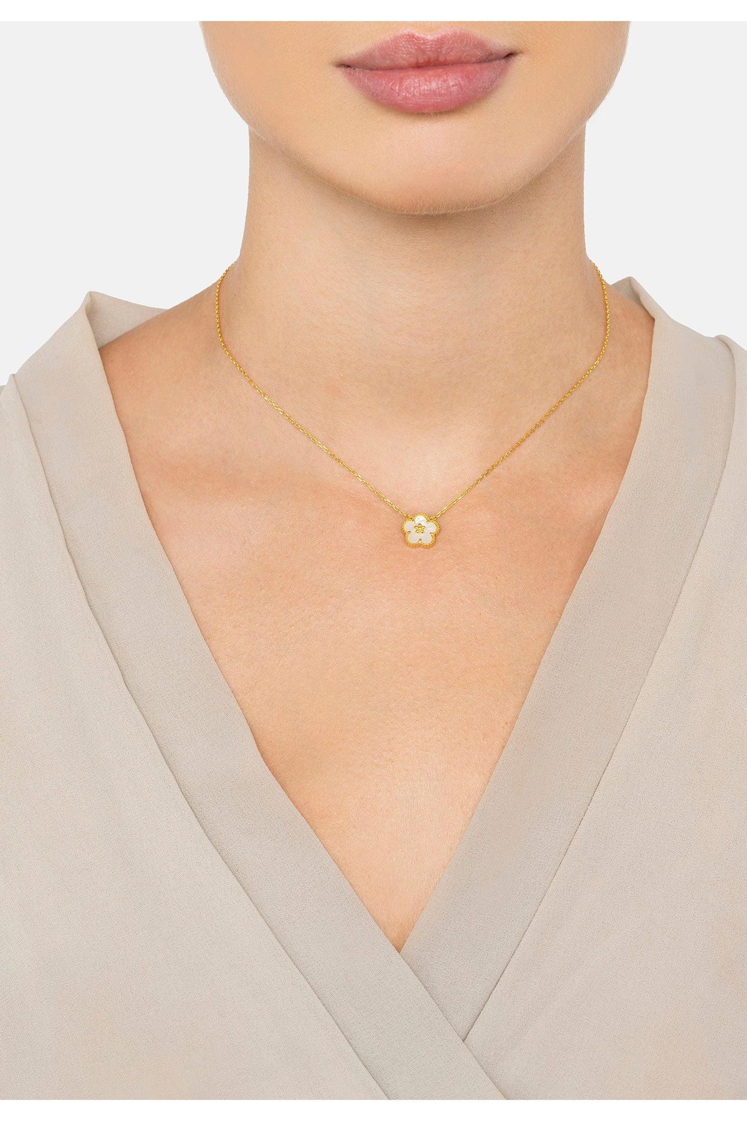The necklace worn by a model.