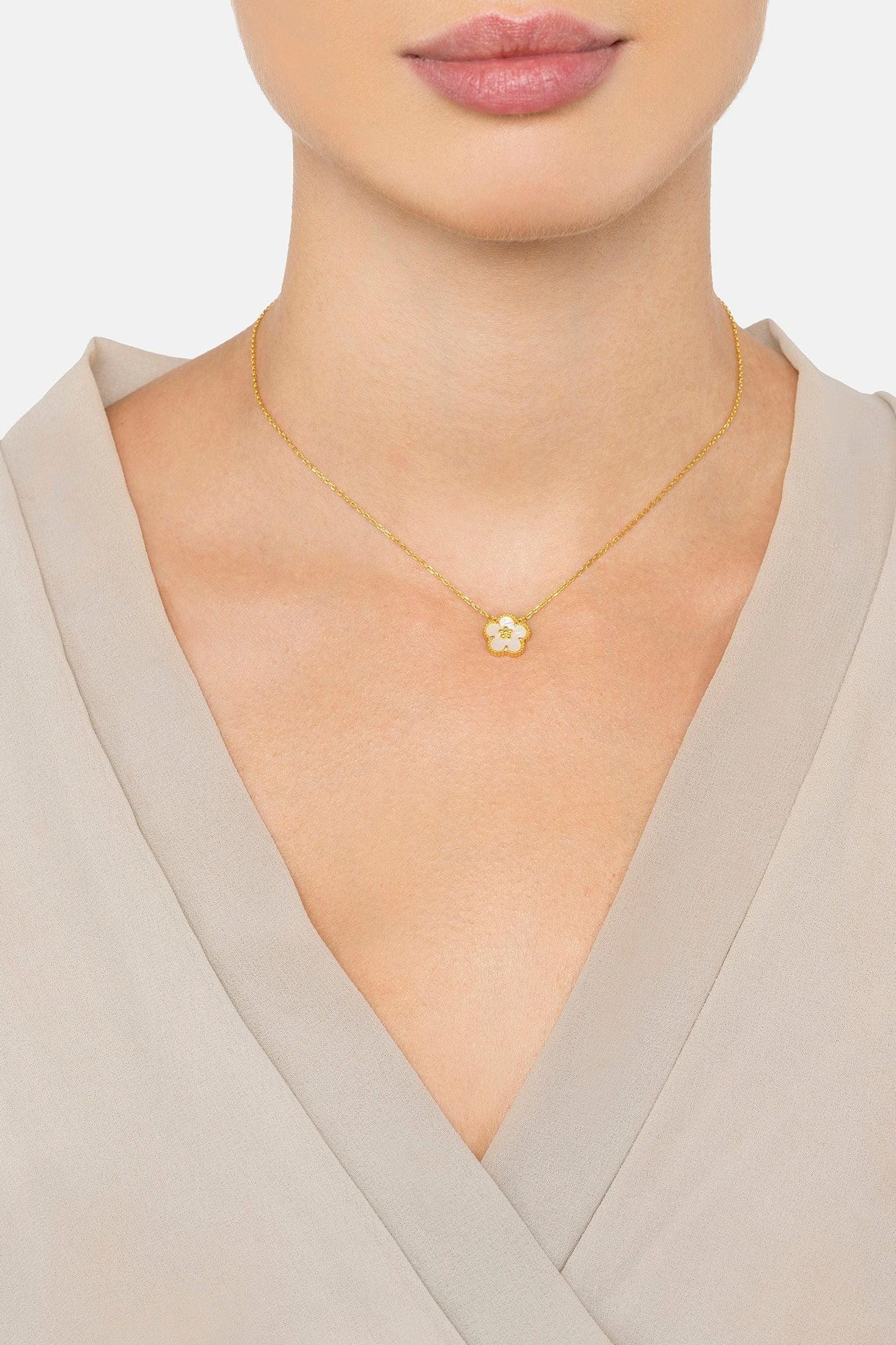The necklace worn by a model.