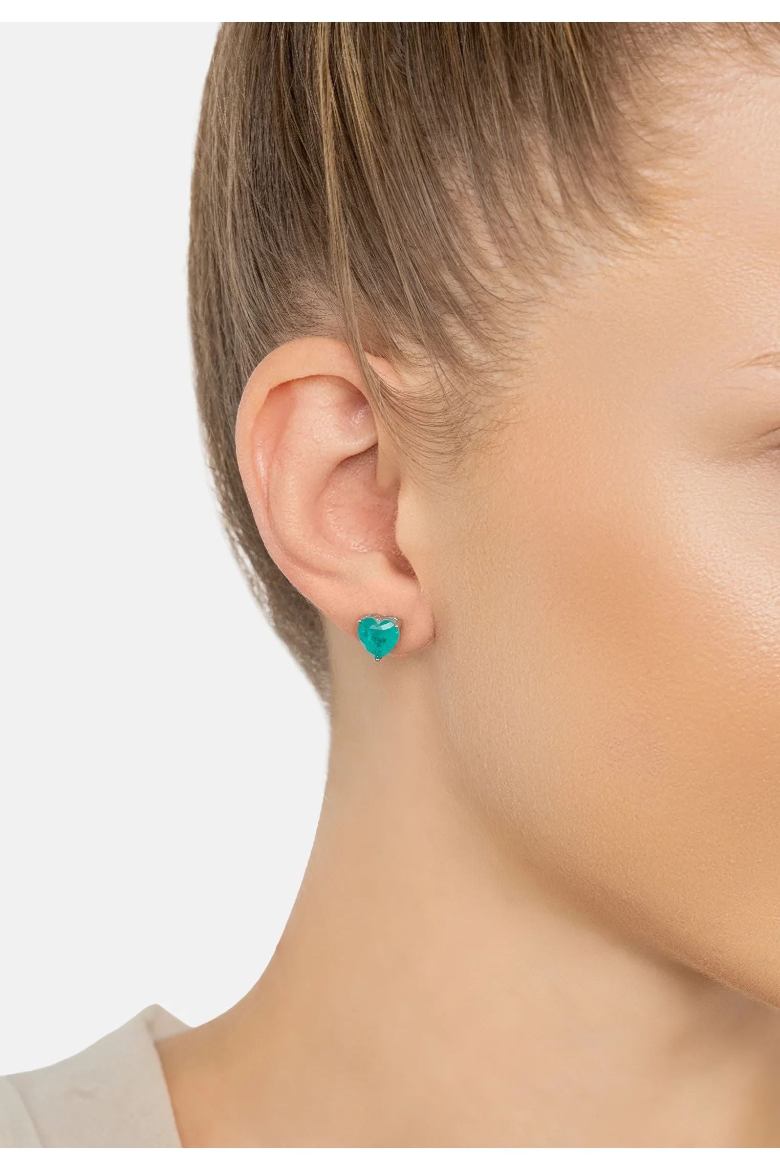 The earring worn by a model.