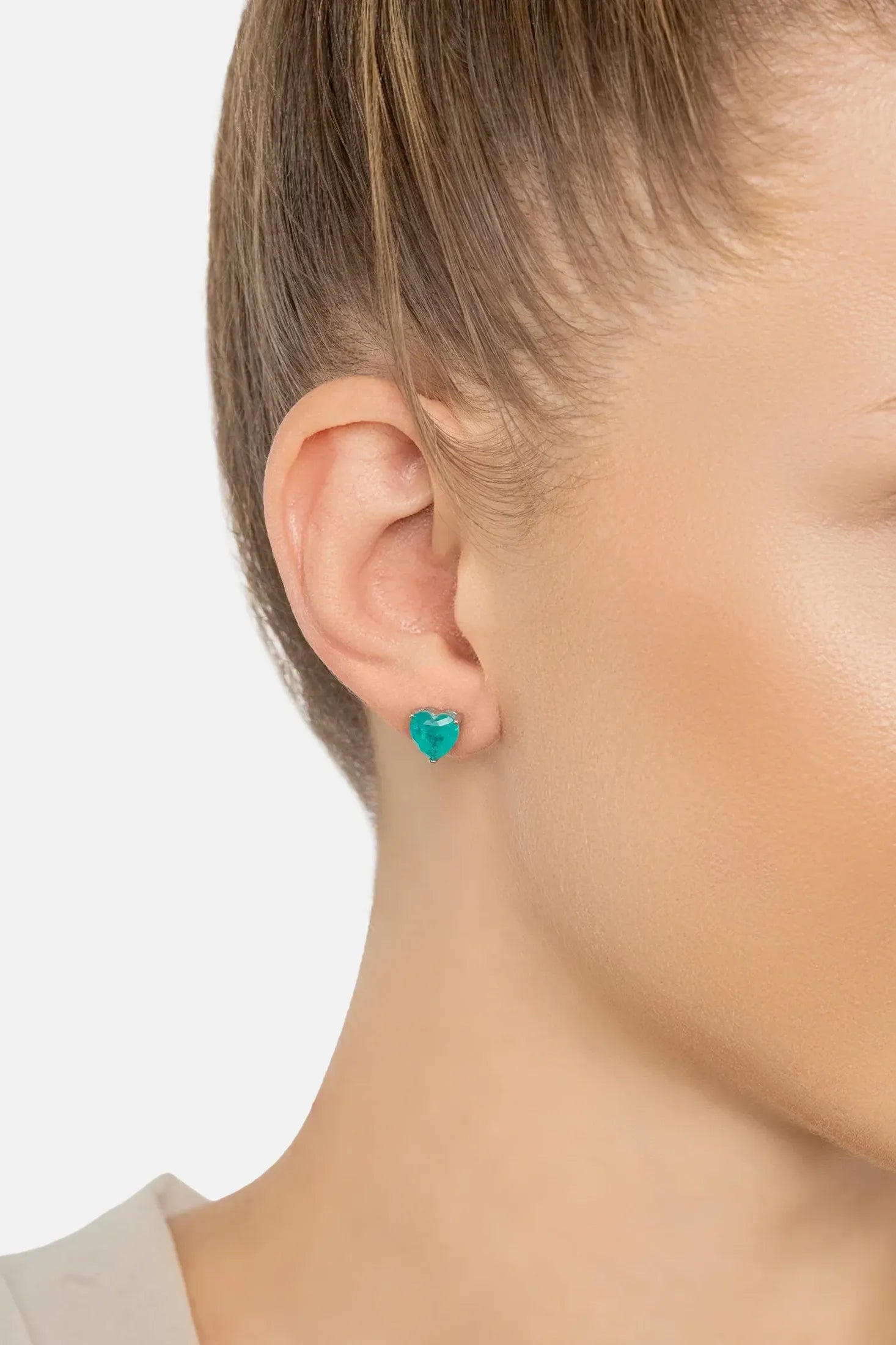The earring worn by a model.