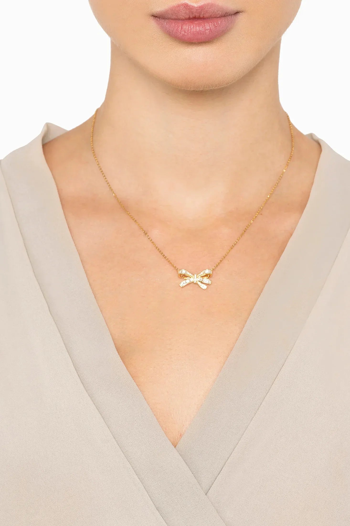 The necklace worn by a model.