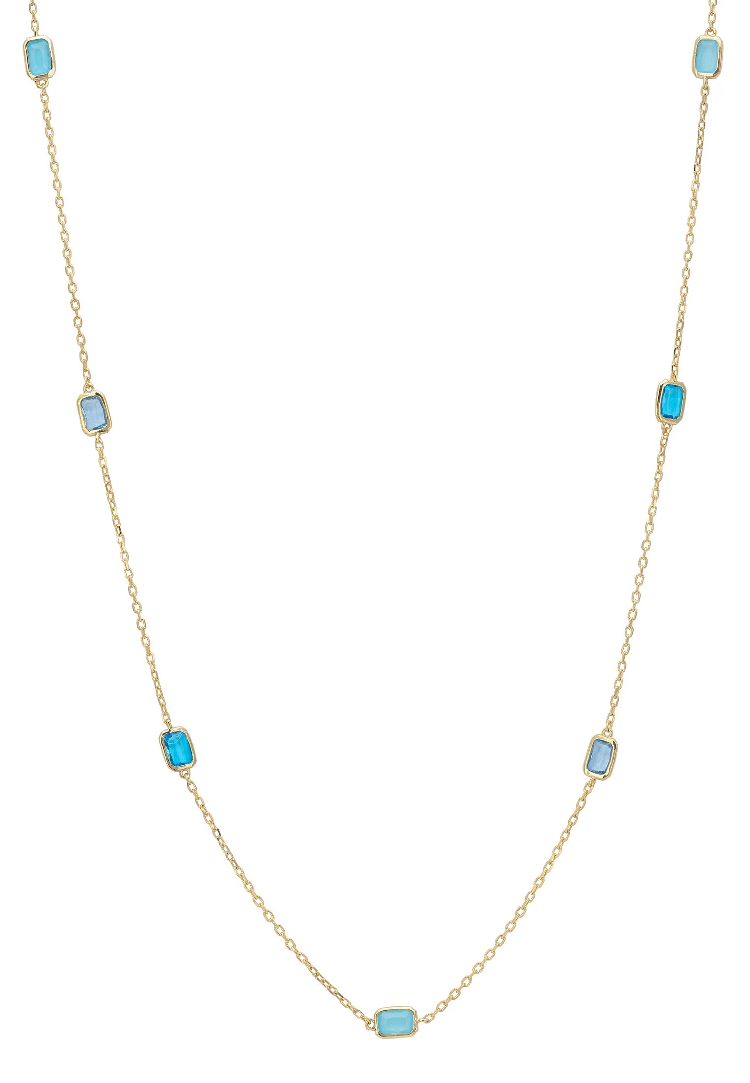 Multiple blue gemstone long gold necklace.