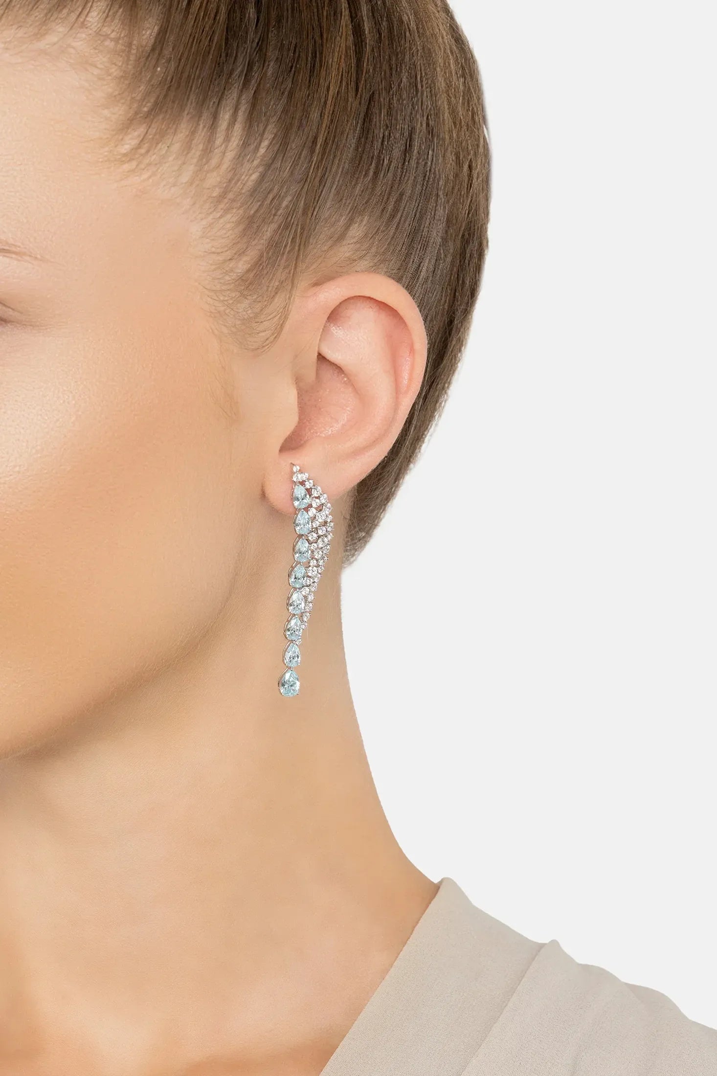 The earring worn by a model.