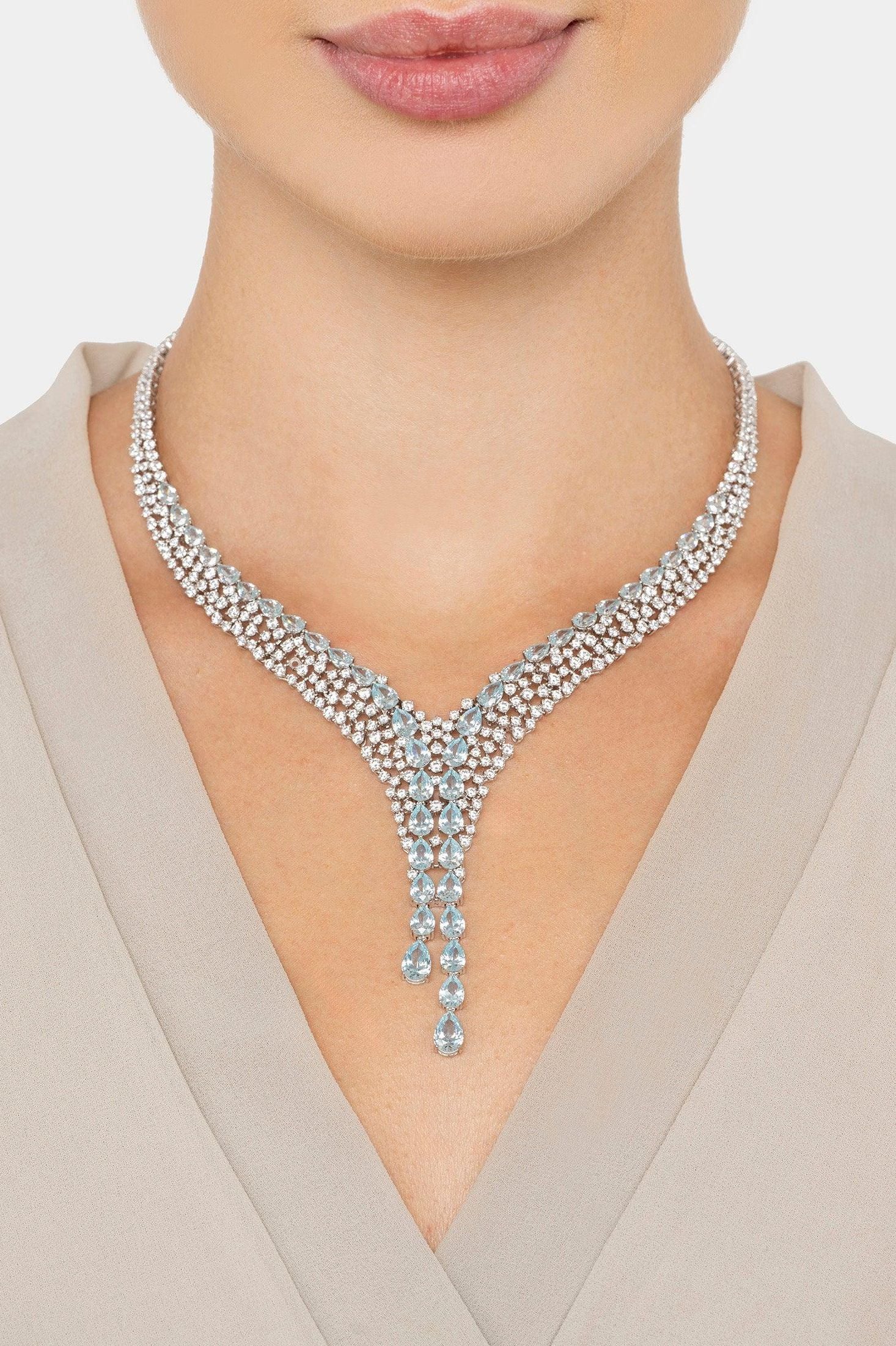 The necklace worn by a model.