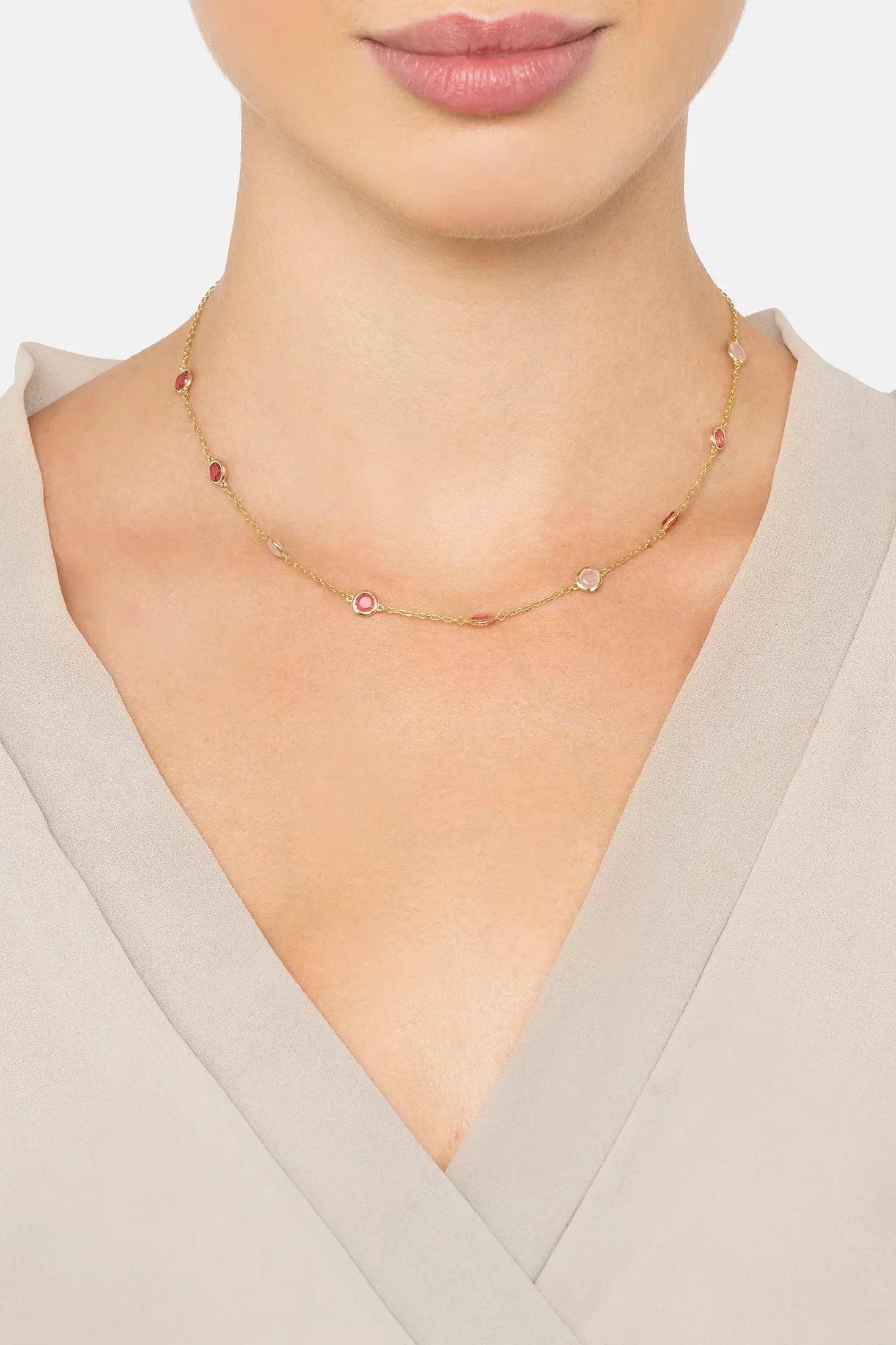 The necklace worn by a model.