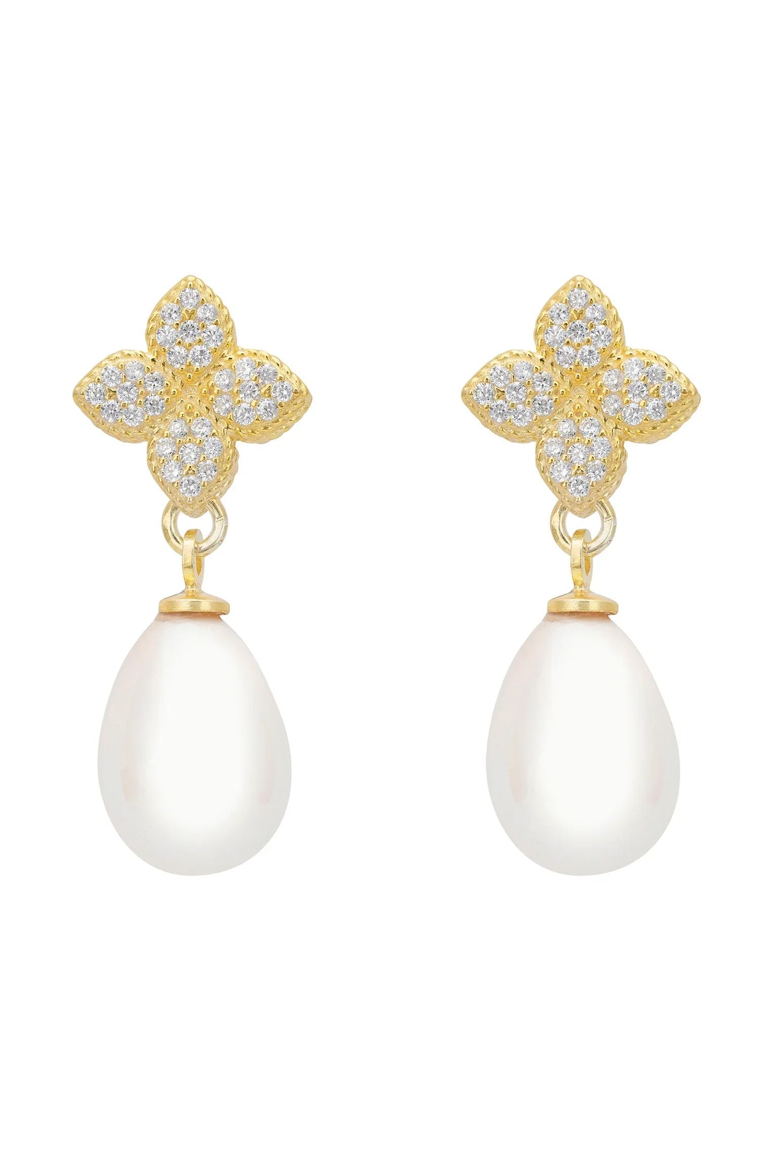 Pearl and gold clover earrings.