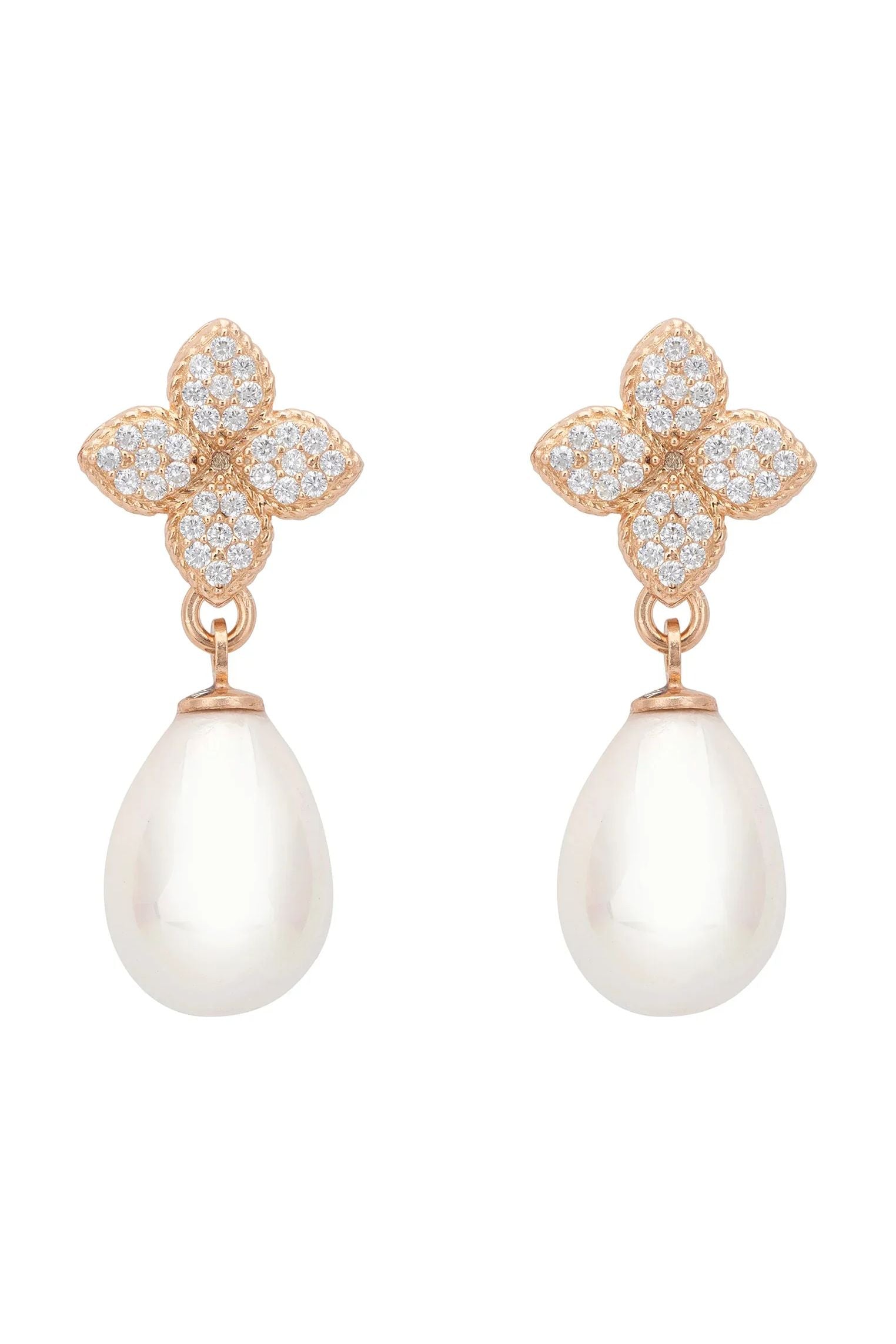 Pearl and rose gold clover earrings.