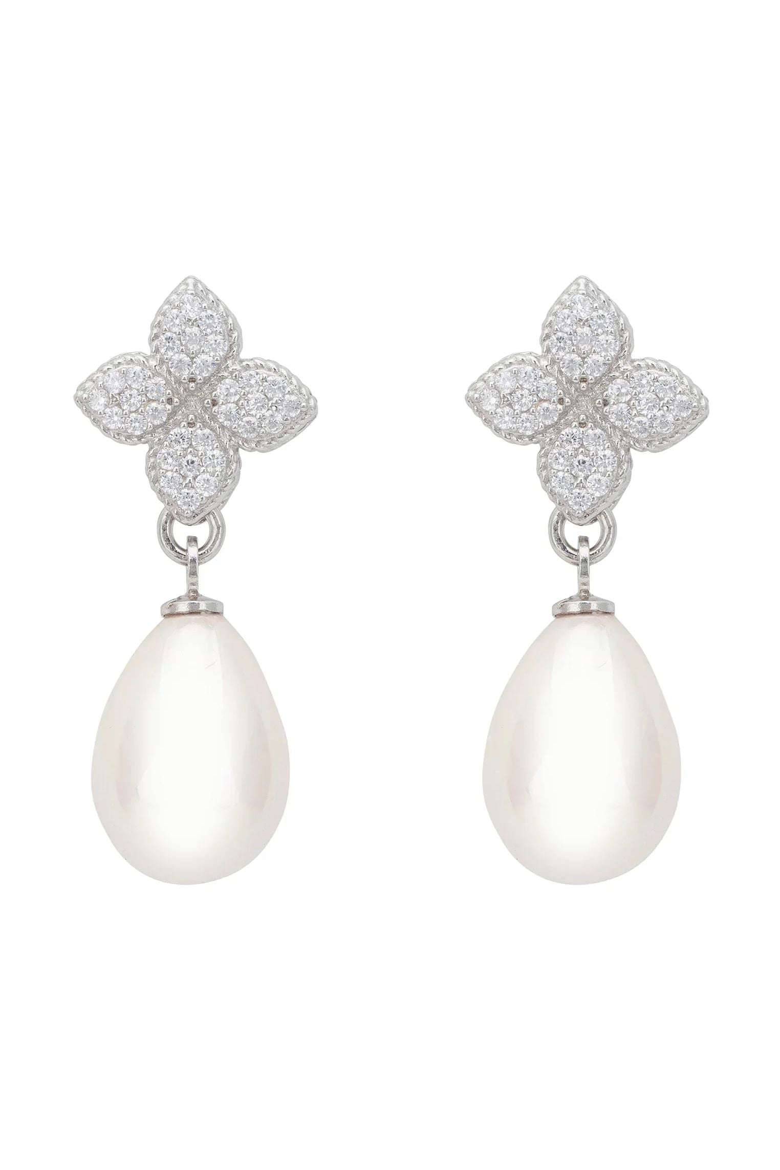 Pearl and diamond clover earrings.