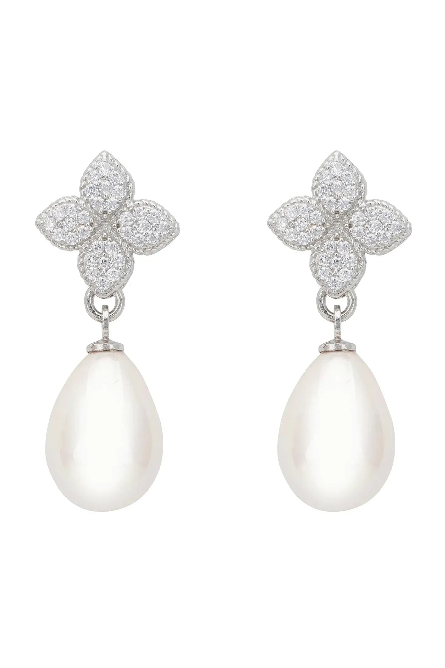 Pearl and diamond clover earrings.