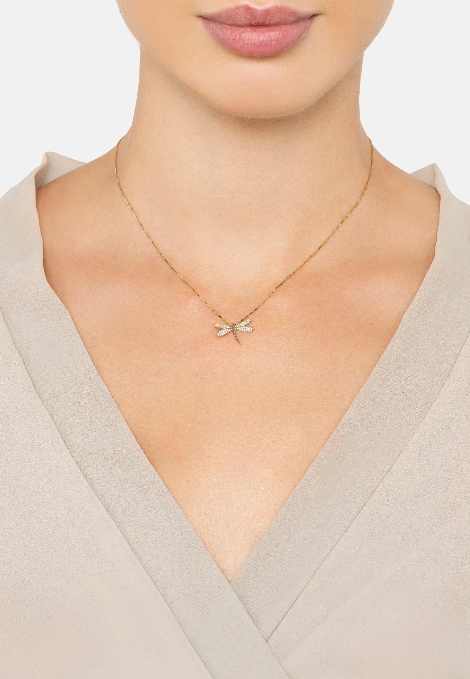 The necklace worn by a model.