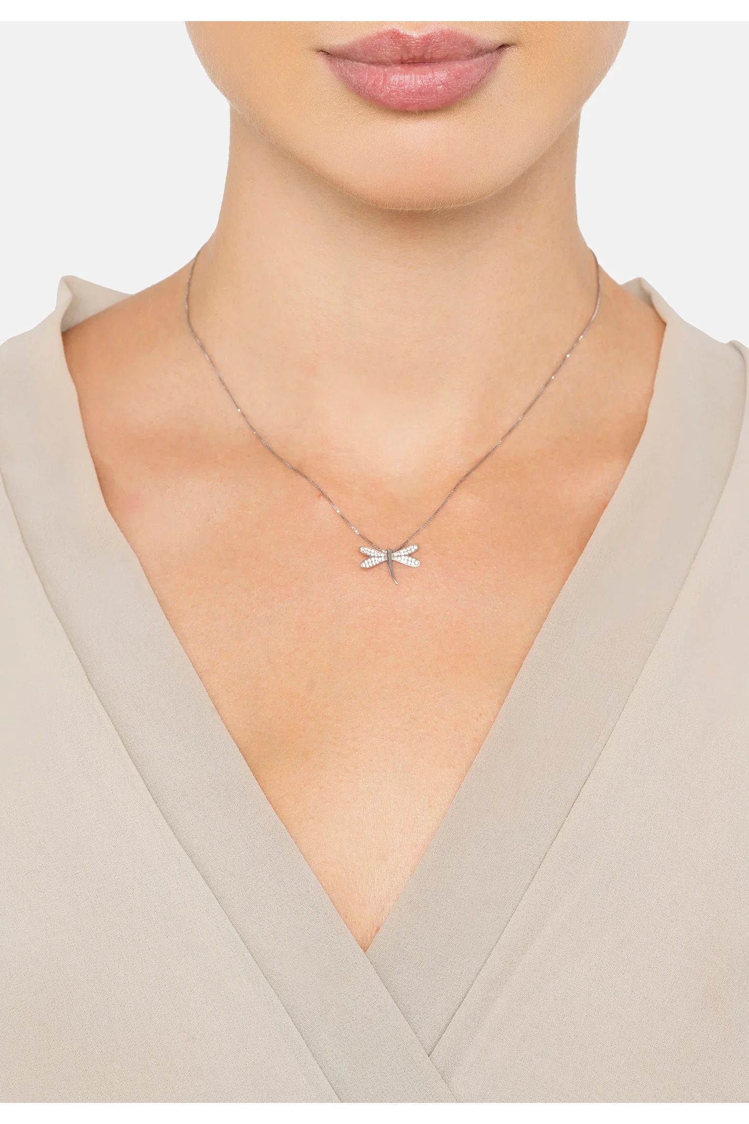 The necklace worn by a model.