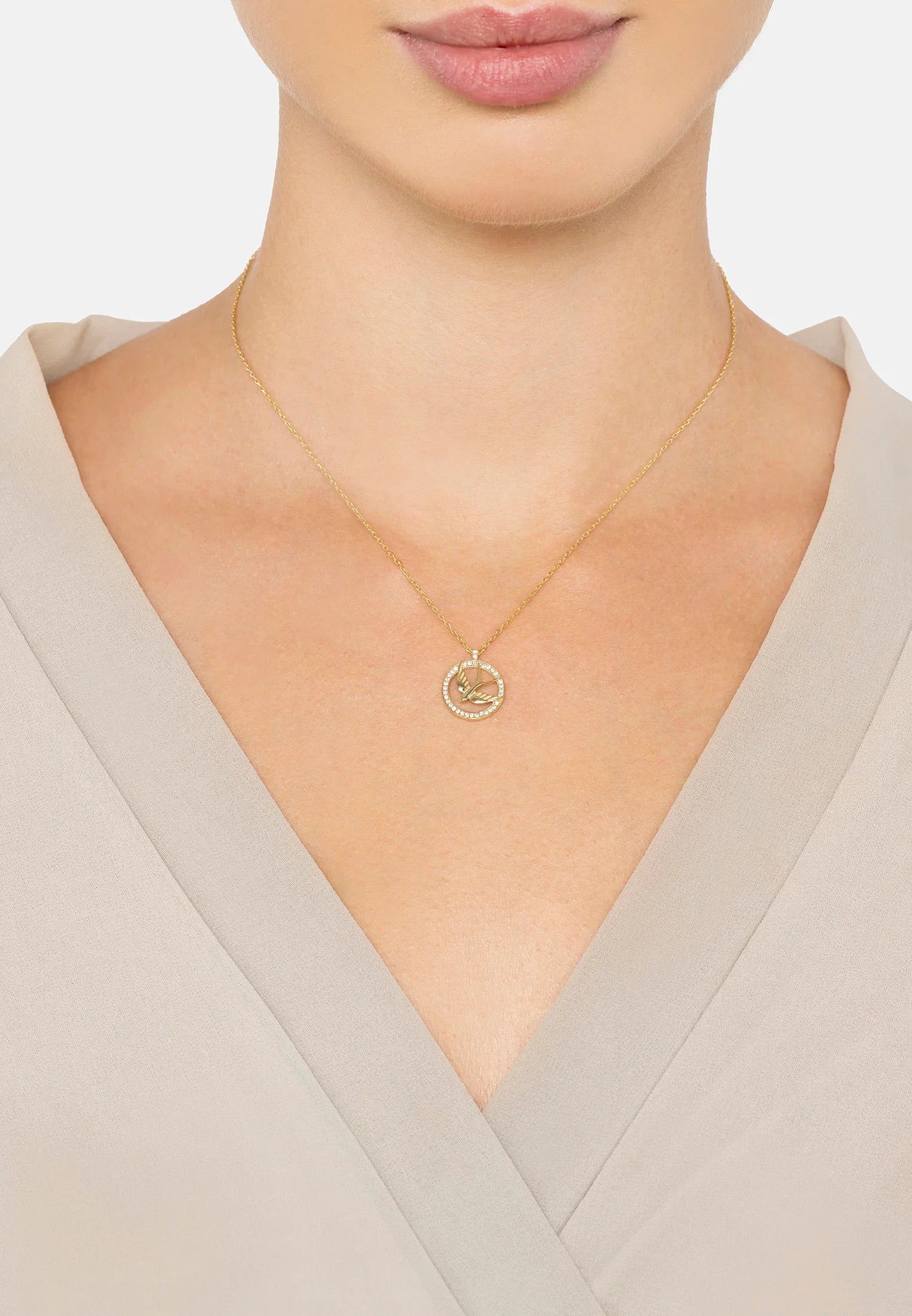 The necklace worn by a model.