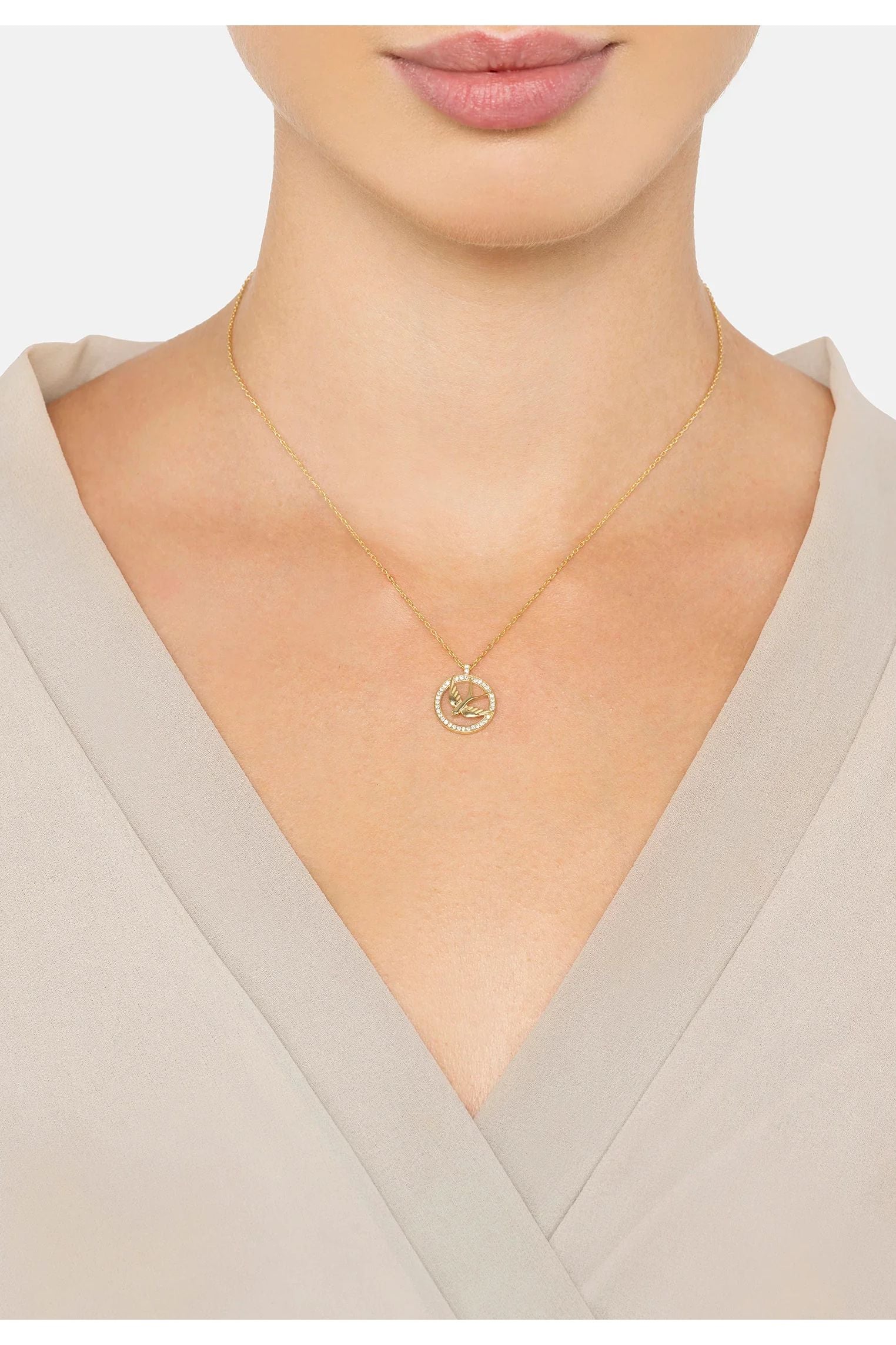 The necklace worn by a model.