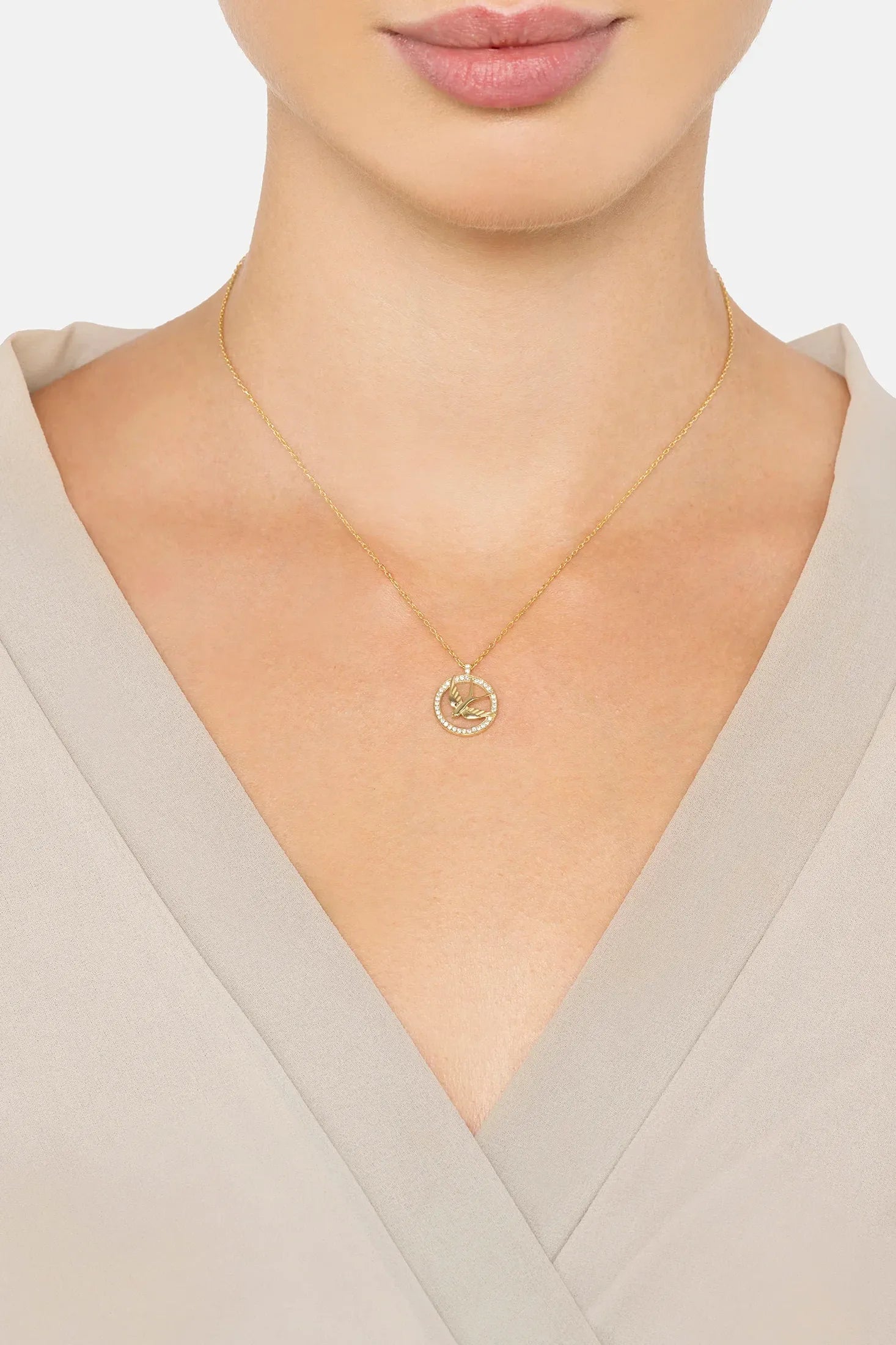 The necklace worn by a model.