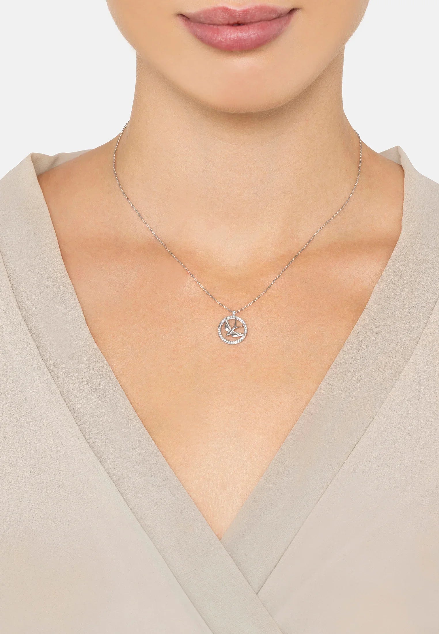 The necklace worn by a model.