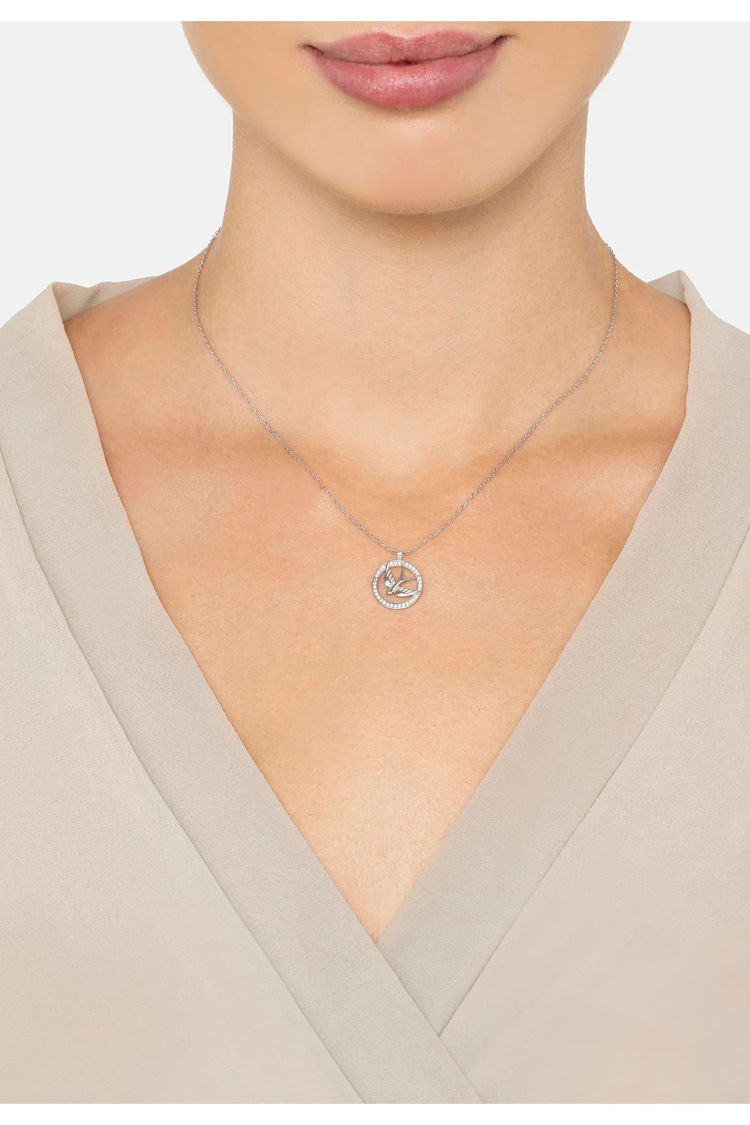 The necklace worn by a model.