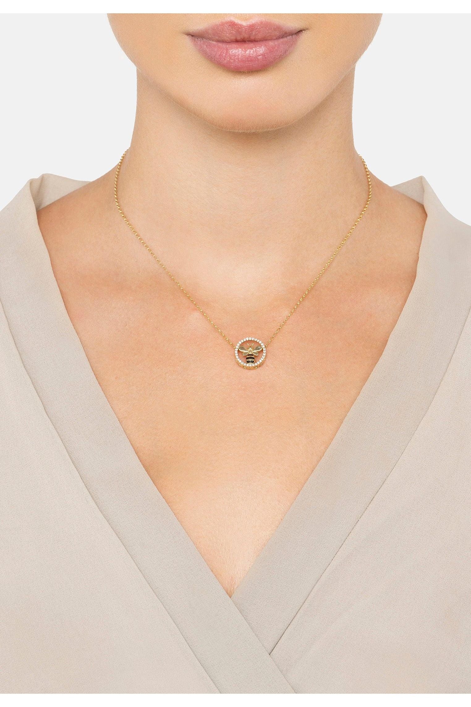 The necklace worn by a model.