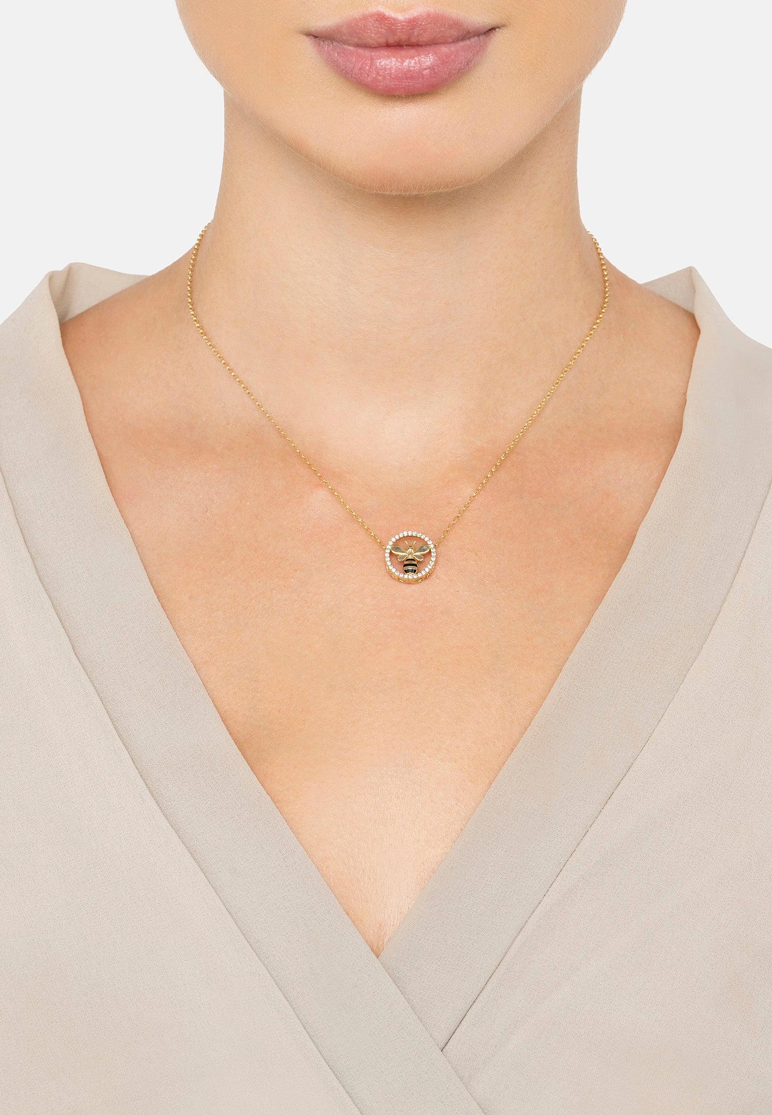 The necklace worn by a model.