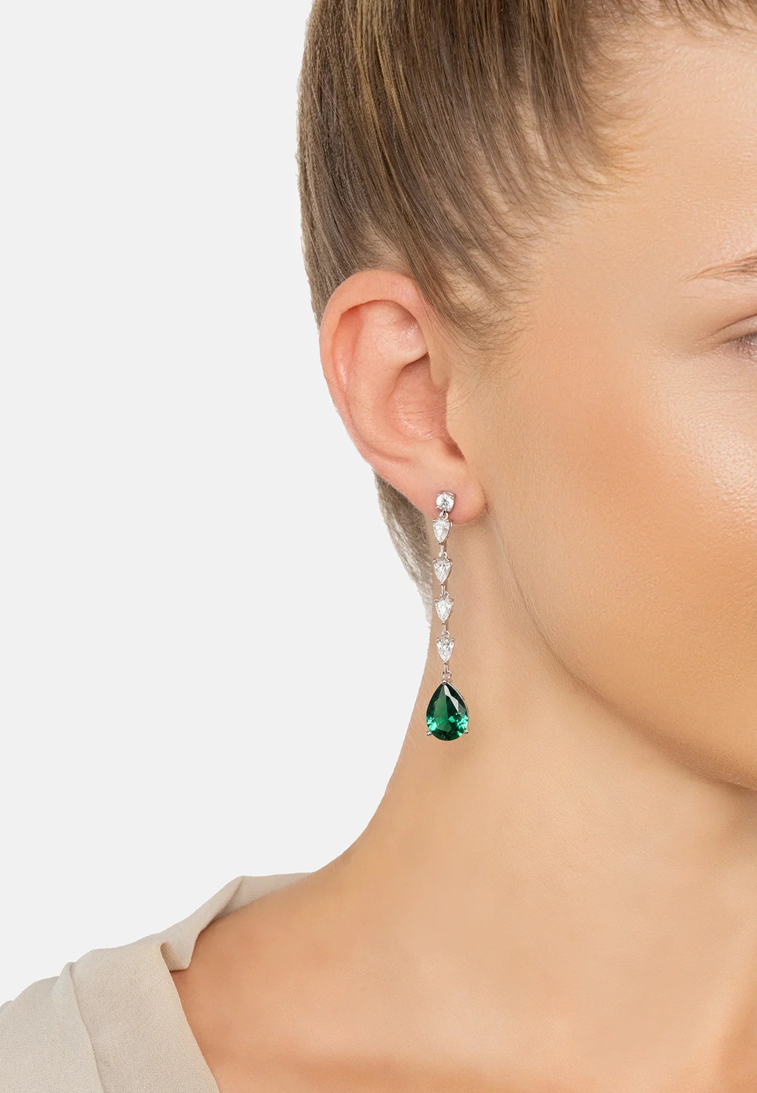 The earring worn by a model.