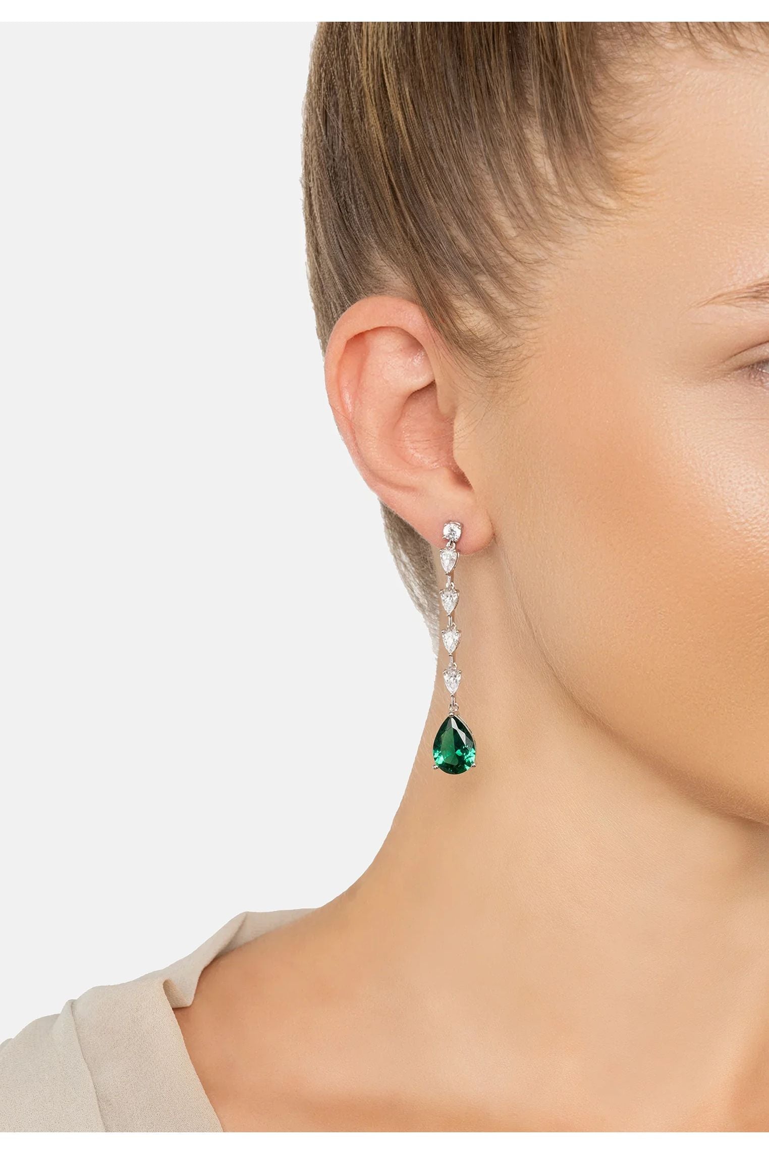 The earring worn by a model.