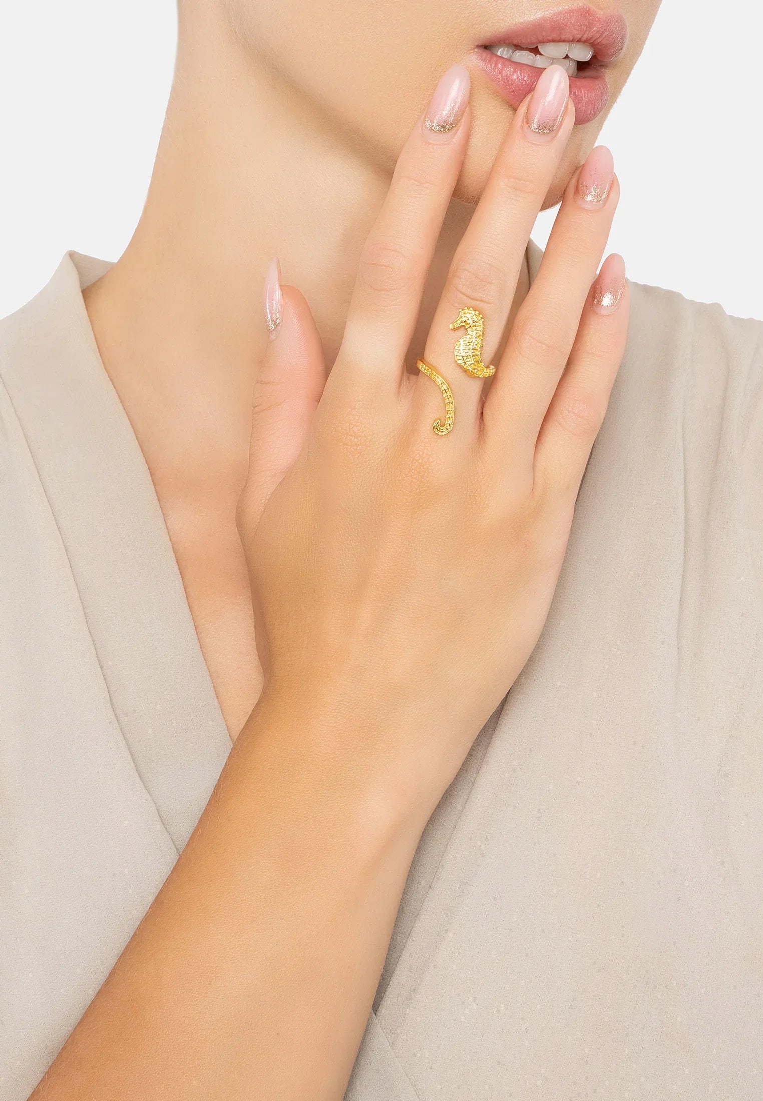 The ring worn by a model.
